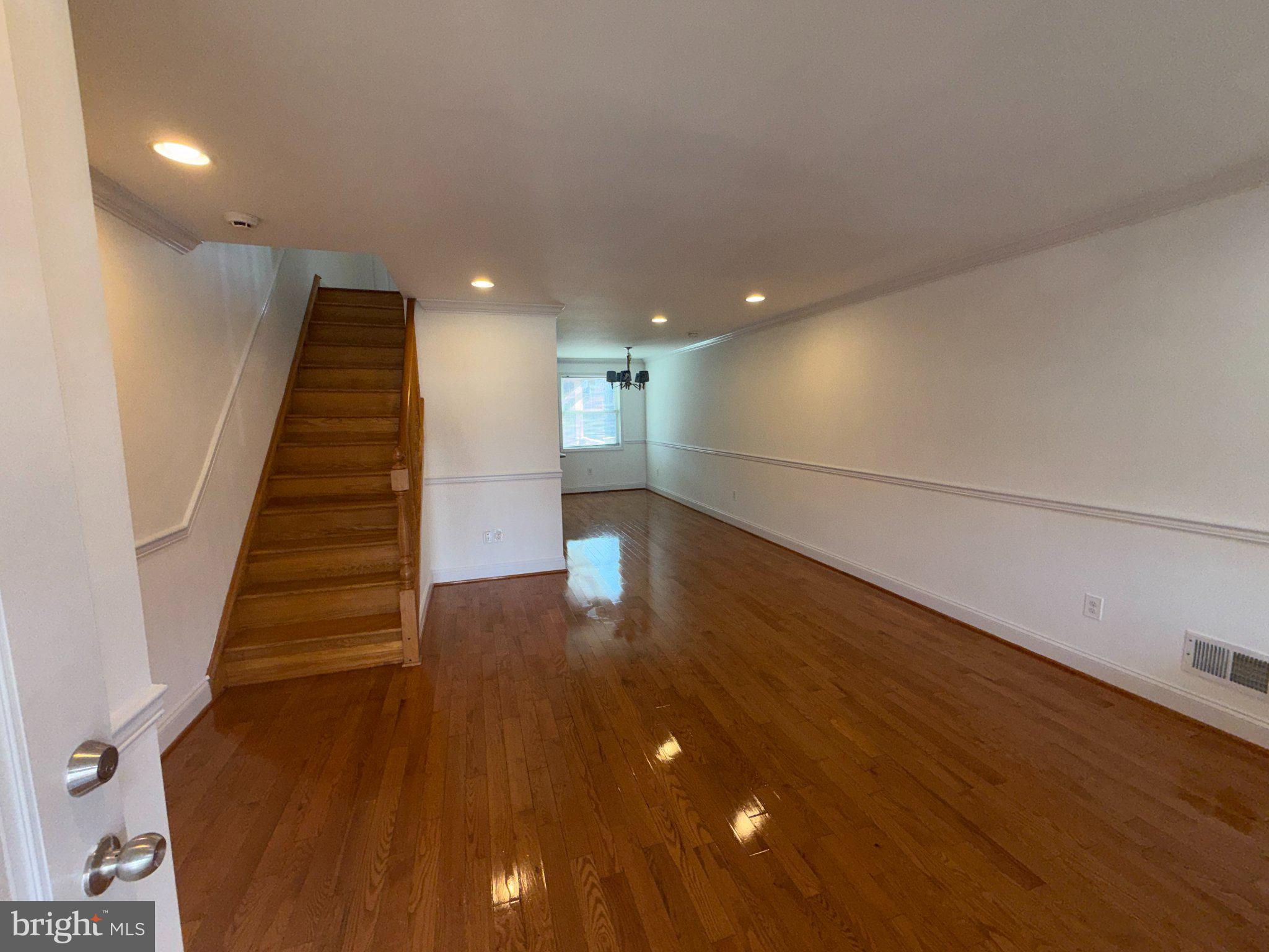 1907 Penhall Road Dundalk, MD 21222 - Photo 3 of 64 a view of entryway and hall with wooden floor