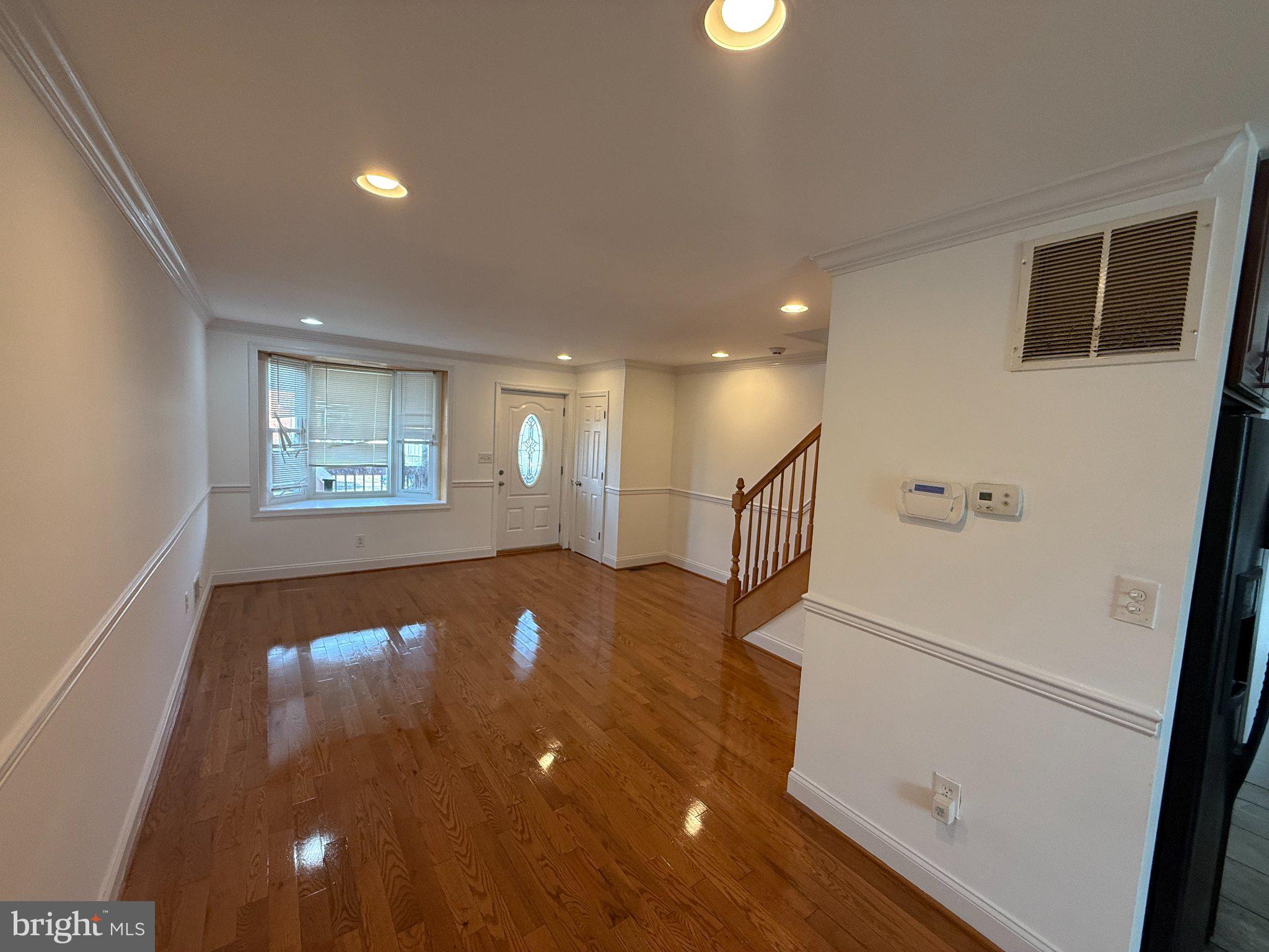 1907 Penhall Road Dundalk, MD 21222 - Photo 32 of 64 a view of an entryway with wooden floor