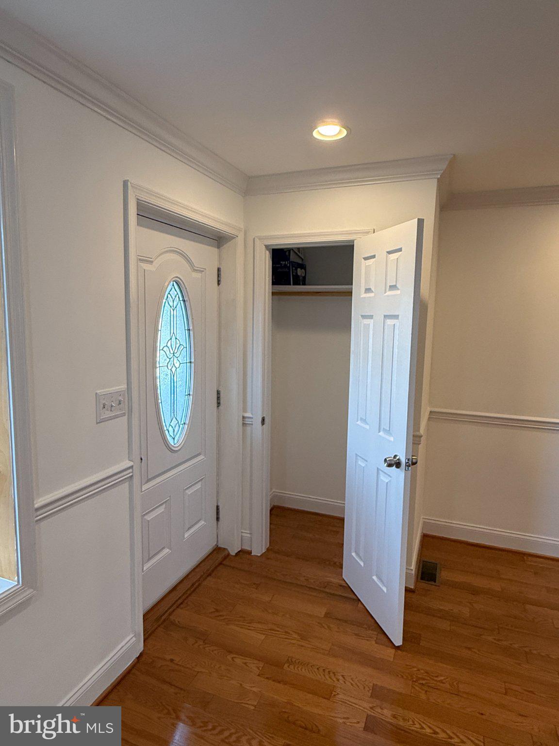 1907 Penhall Road Dundalk, MD 21222 - Photo 39 of 64 a view of a room with wooden floor and entryway