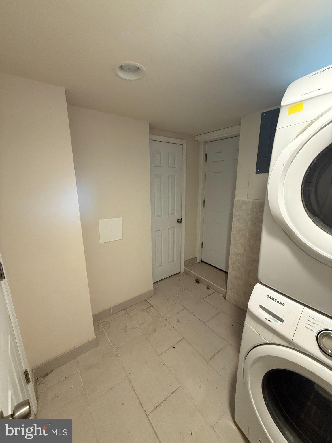 1907 Penhall Road Dundalk, MD 21222 - Photo 50 of 64 a view of a storage & utility room with washer and dryer