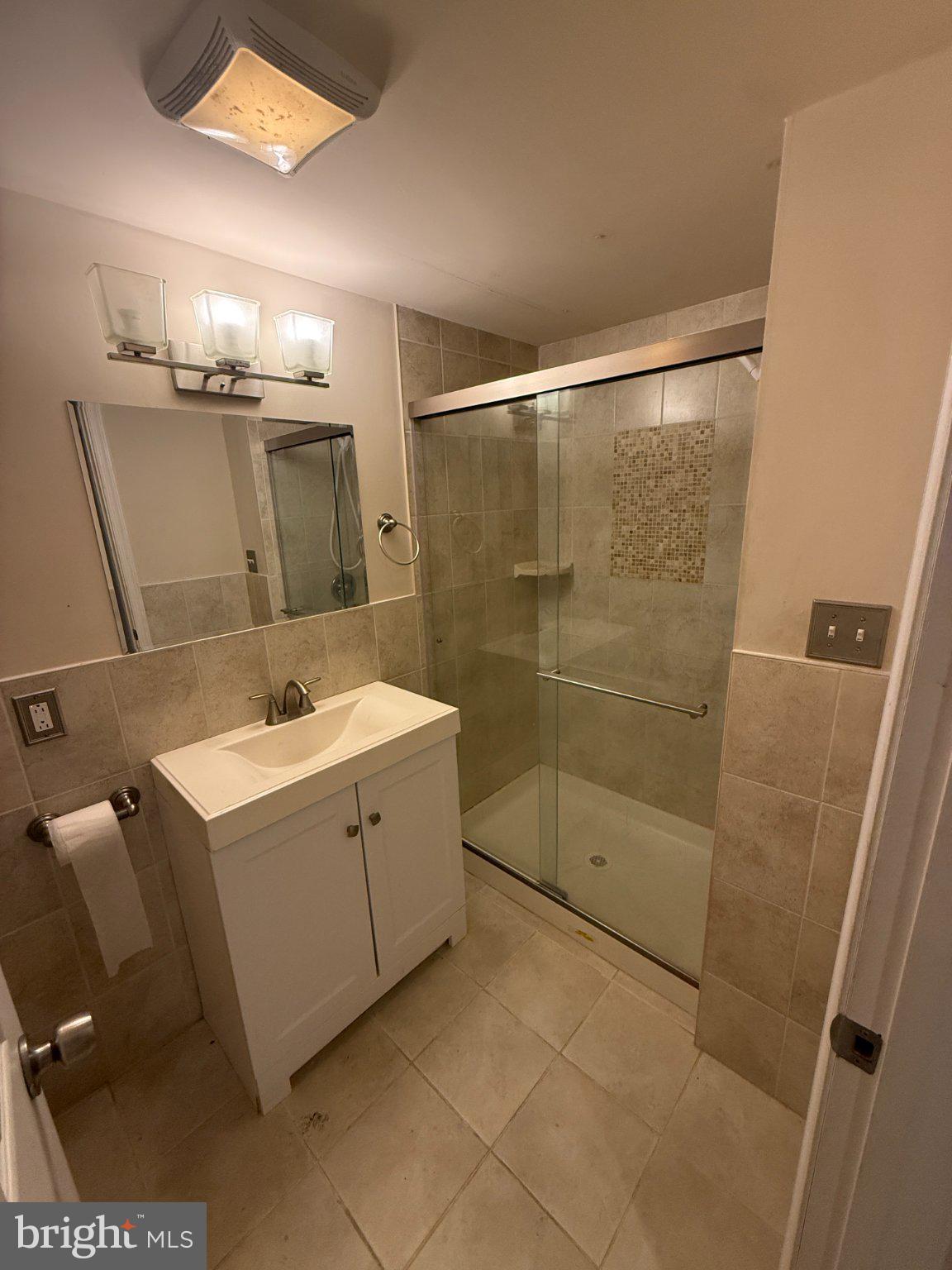 1907 Penhall Road Dundalk, MD 21222 - Photo 5 of 64 a bathroom with a sink toilet and shower
