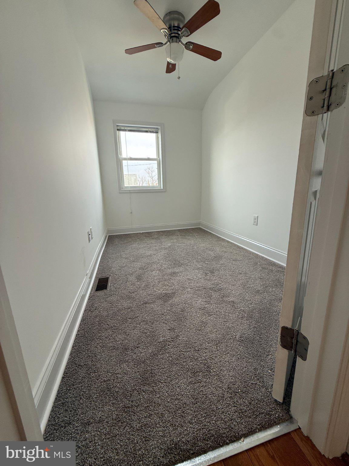 1907 Penhall Road Dundalk, MD 21222 - Photo 59 of 64 a view of an empty room with a window