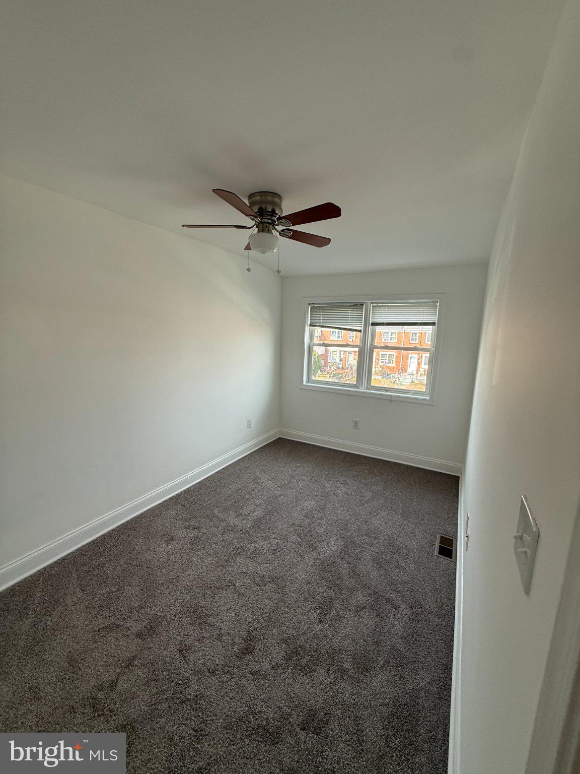 1907 Penhall Road Dundalk, MD 21222 - Photo 10 of 64 a view of an empty room with a window