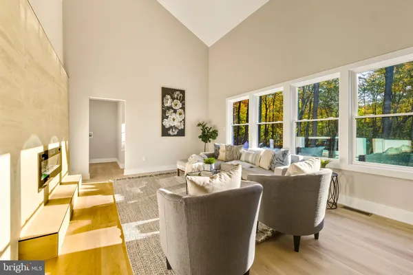 a dining room with a table and chairs