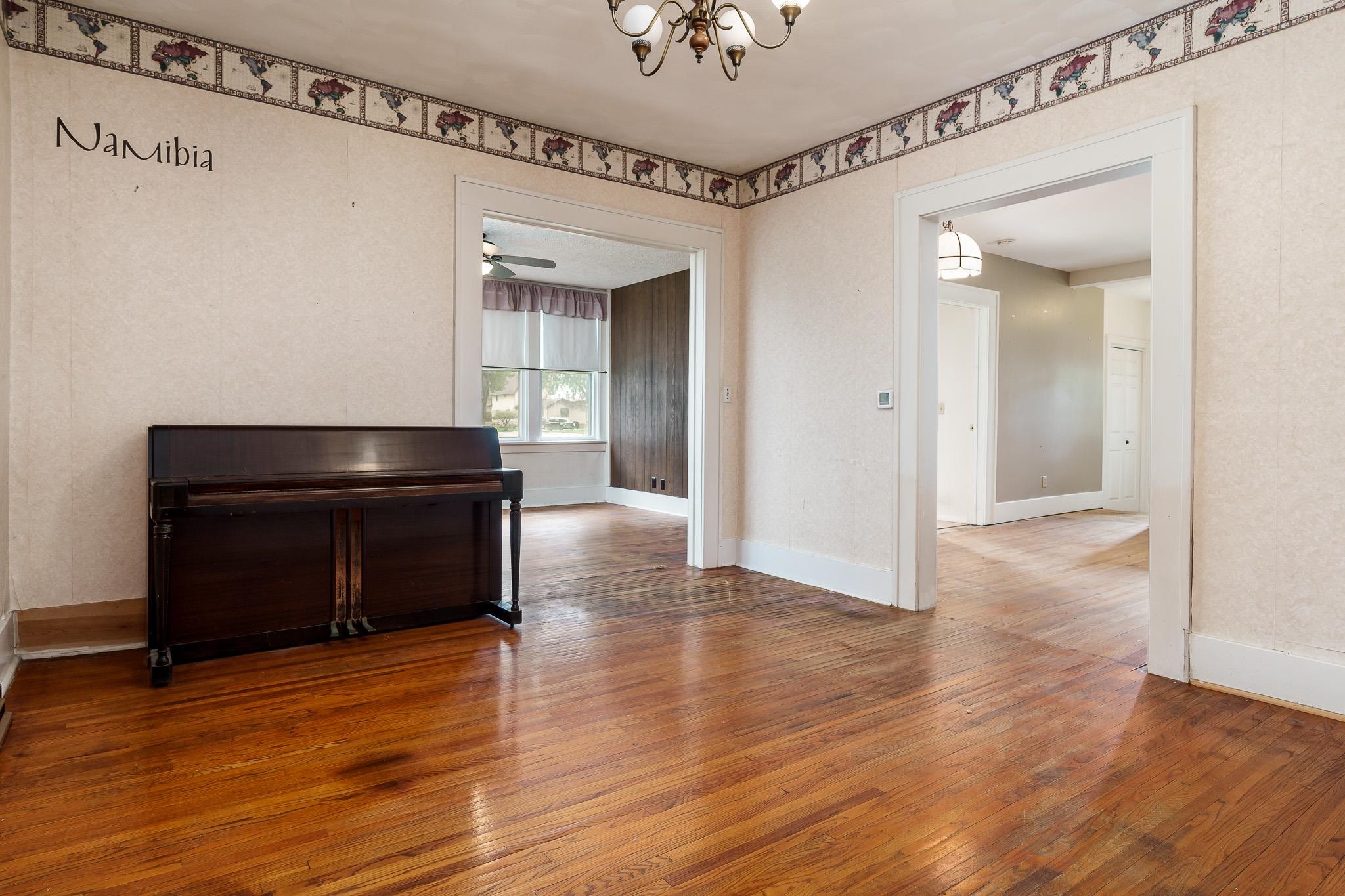 305 West 3rd Street Byron, IL 61010 - Photo 15 of 37 a living room with wooden floor