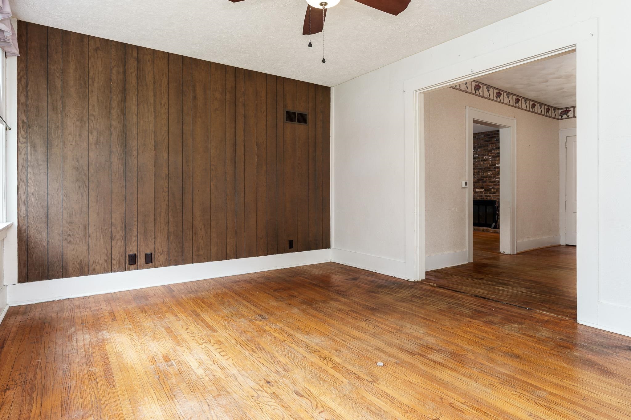 305 West 3rd Street Byron, IL 61010 - Photo 17 of 37 a view of an empty room with wooden floor