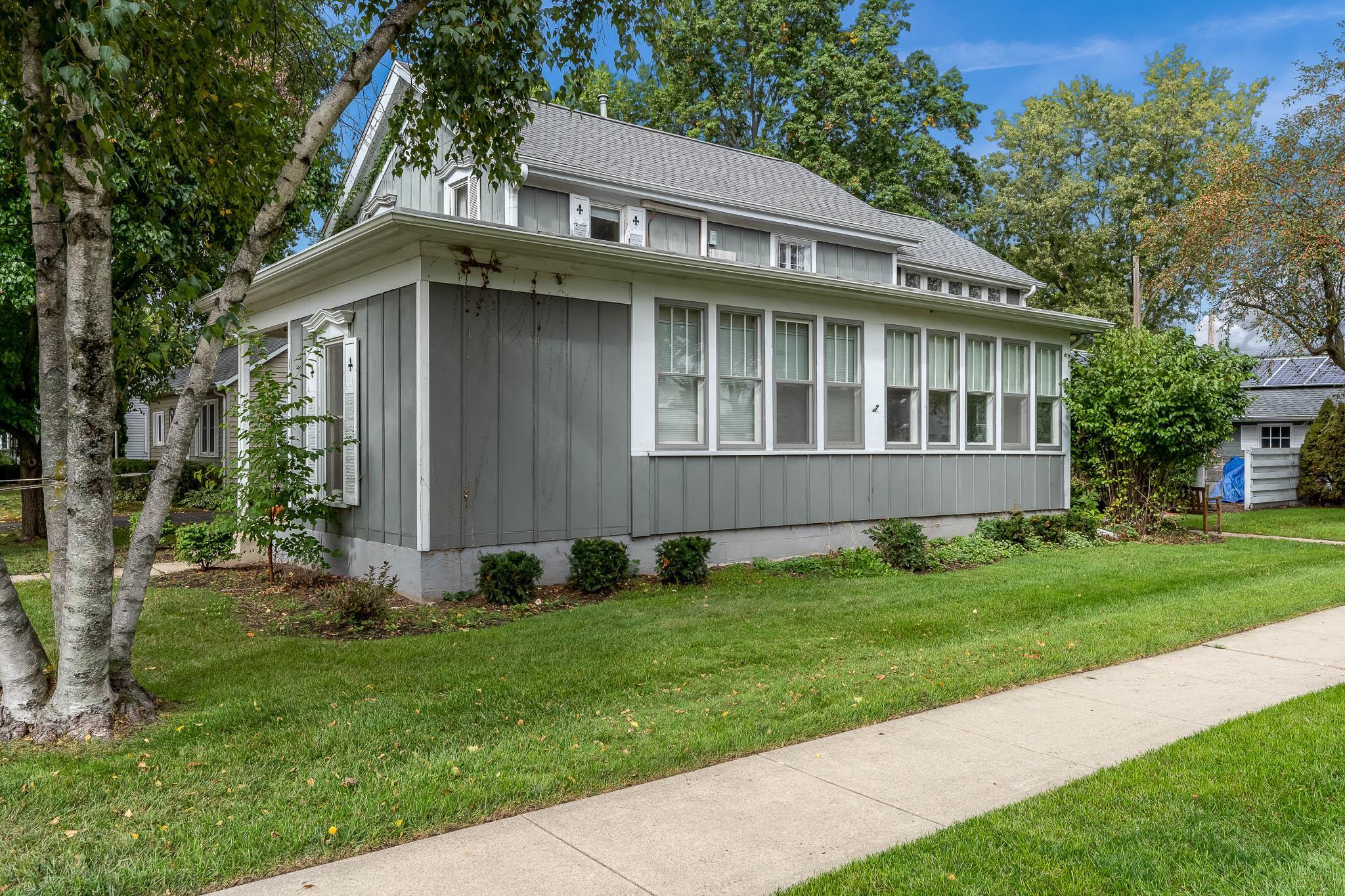 305 West 3rd Street Byron, IL 61010 - Photo 3 of 37 a view of an house with backyard space and garden
