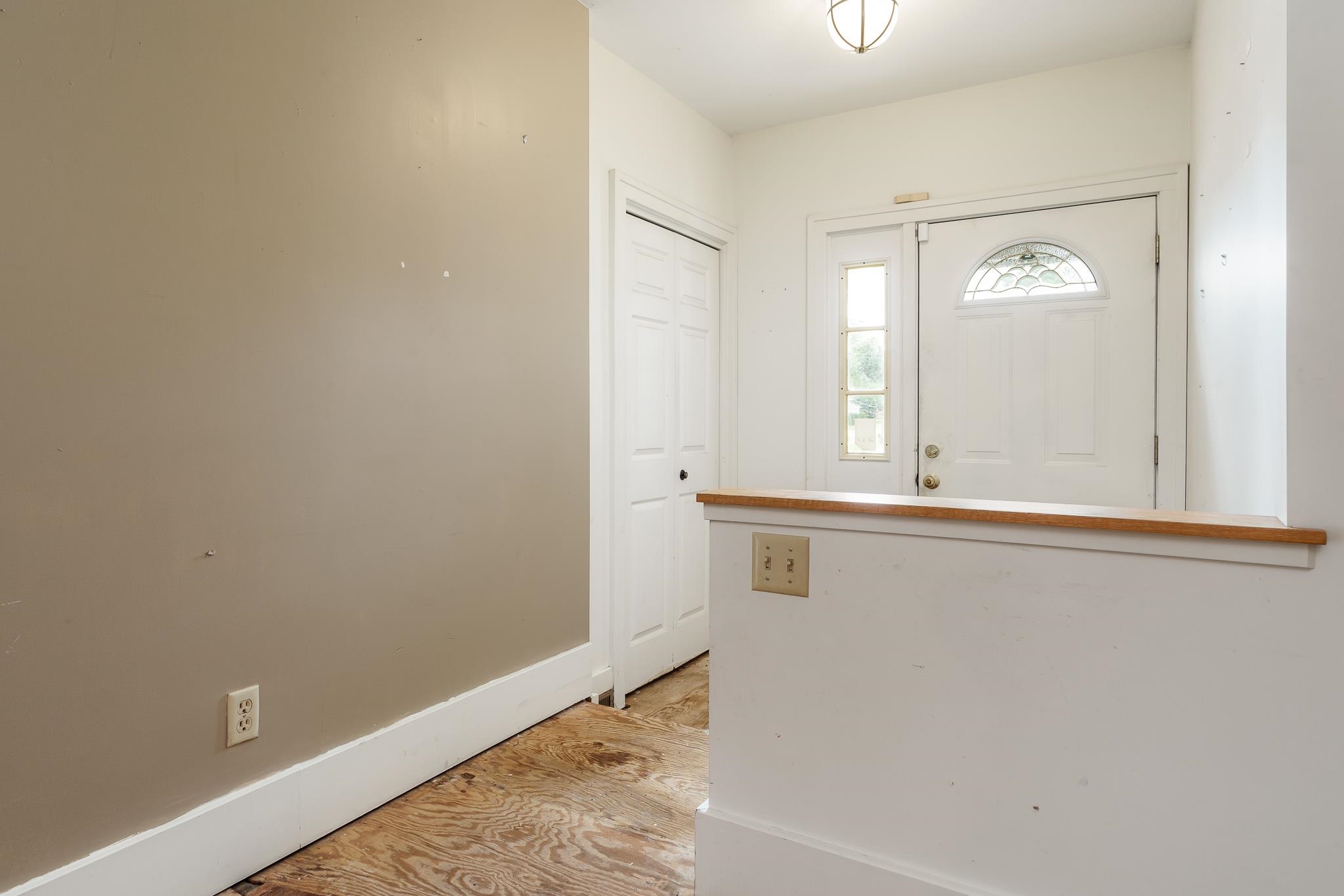 305 West 3rd Street Byron, IL 61010 - Photo 6 of 37 a view of a window in a room