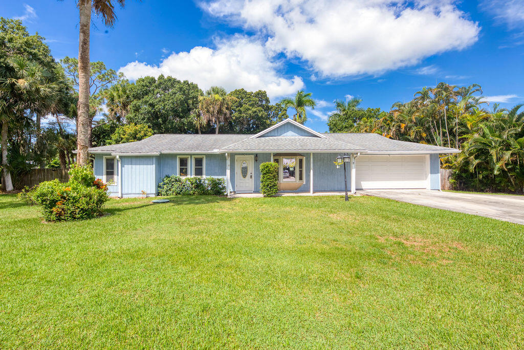 6856 Southwest Chase Court Stuart, FL 34997 - Photo 1 of 45 Front of Home