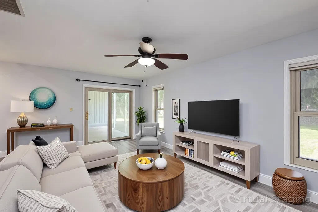 6856 Southwest Chase Court Stuart, FL 34997 - Photo 16 of 45 3-Chase-Family-Room-Virtually-Staged