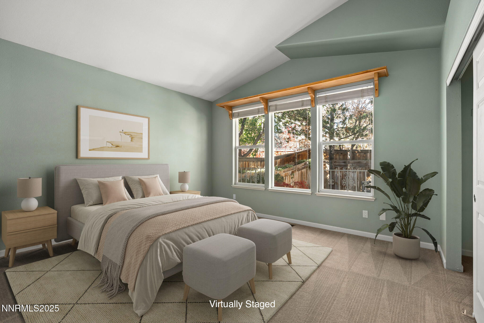 825 Caughlin Crossing, Unit CAUGHLIN RANCH PKWY Reno, NV 89519 - Photo 13 of 35 a bedroom with a bed and a large window