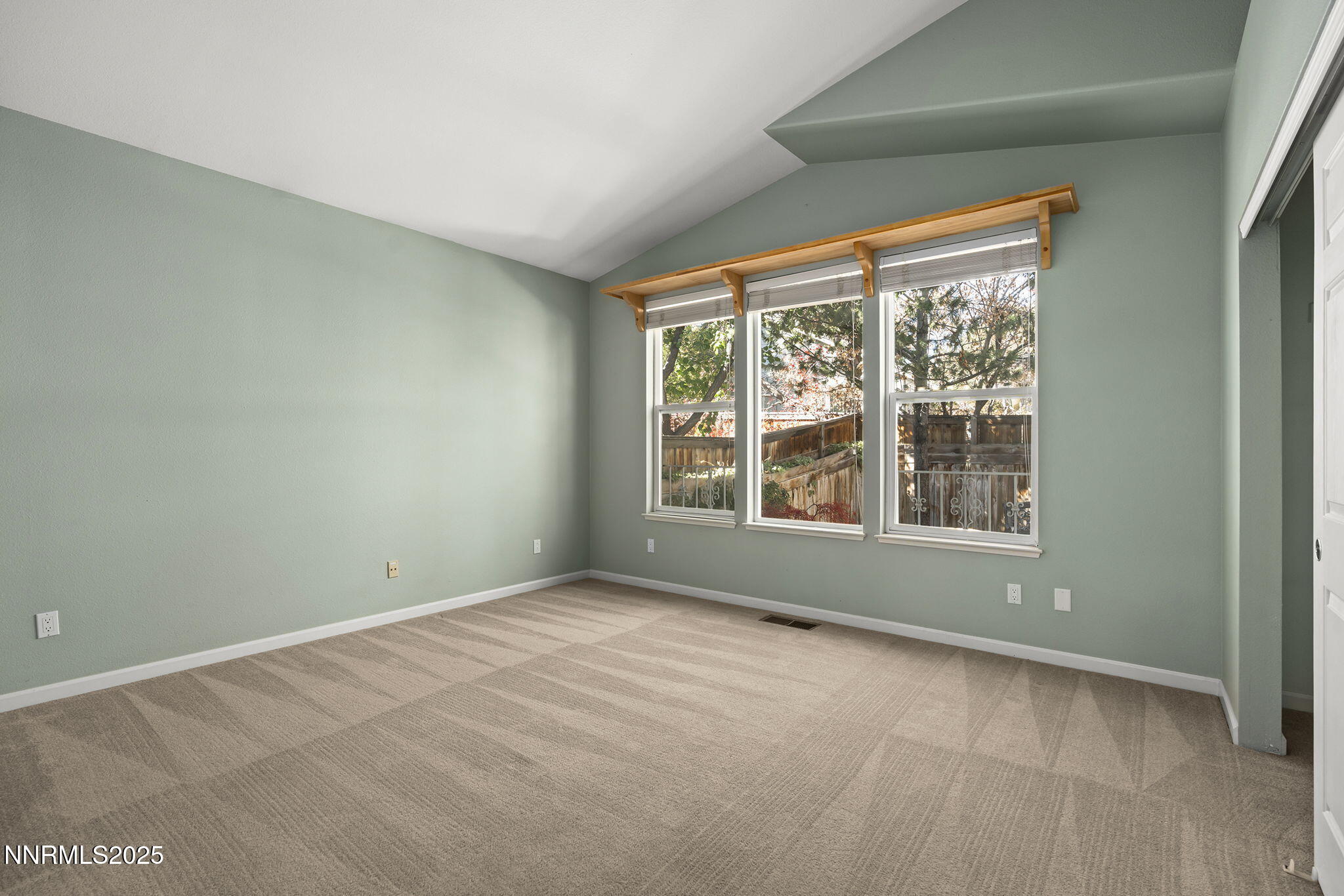 825 Caughlin Crossing, Unit CAUGHLIN RANCH PKWY Reno, NV 89519 - Photo 14 of 35 an empty room with windows