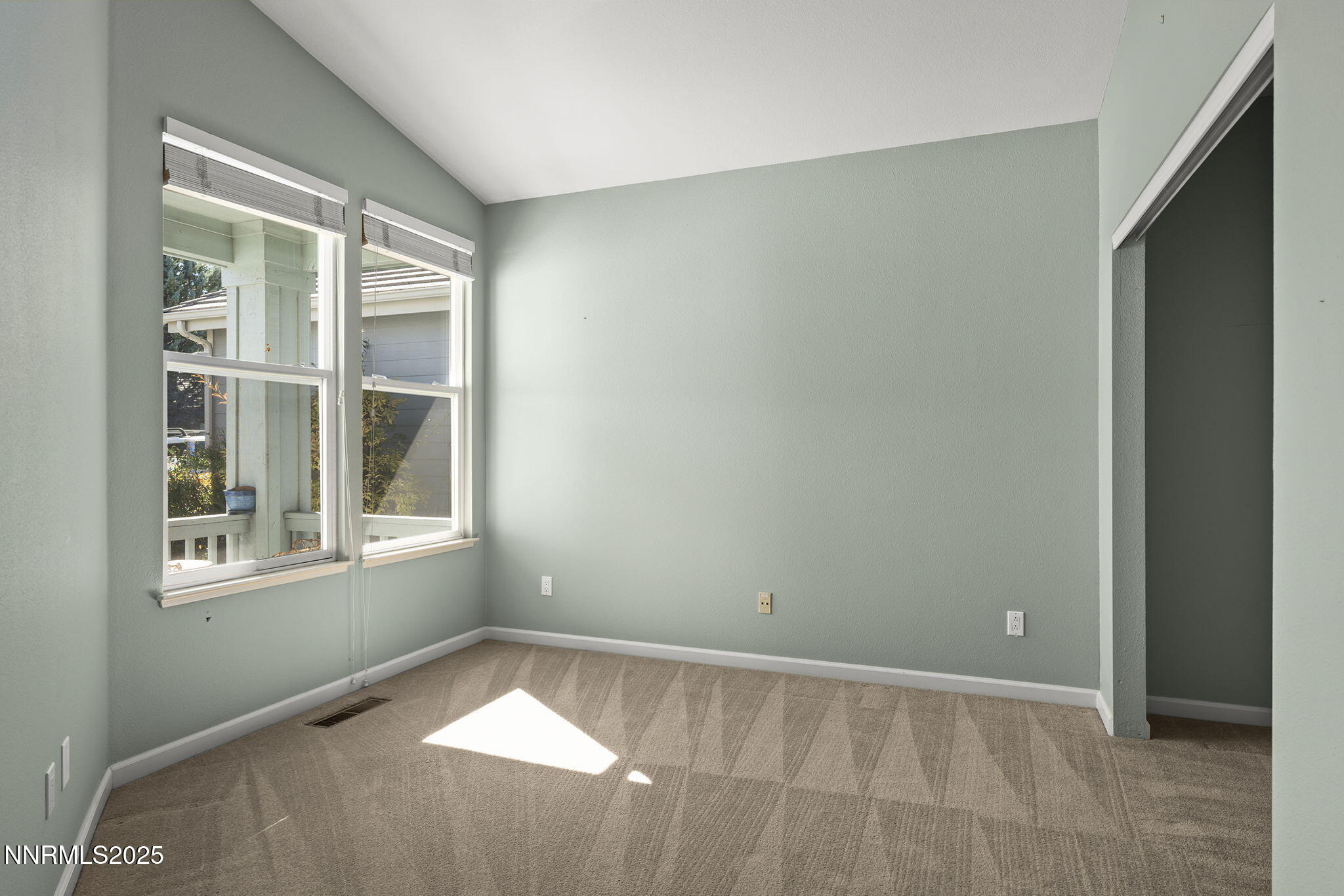 825 Caughlin Crossing, Unit CAUGHLIN RANCH PKWY Reno, NV 89519 - Photo 18 of 35 an empty room with windows
