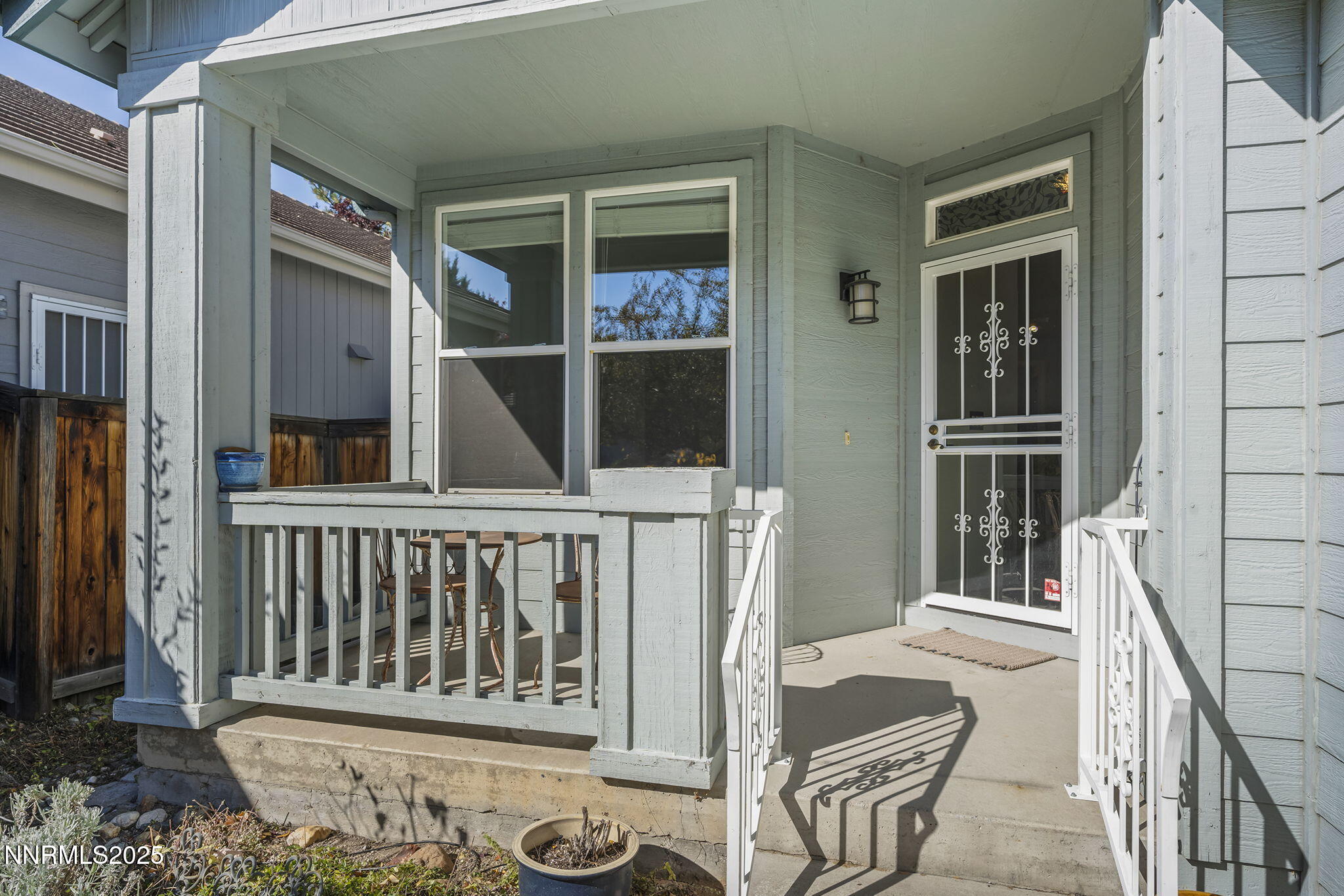 825 Caughlin Crossing, Unit CAUGHLIN RANCH PKWY Reno, NV 89519 - Photo 2 of 35 a porch with a bench