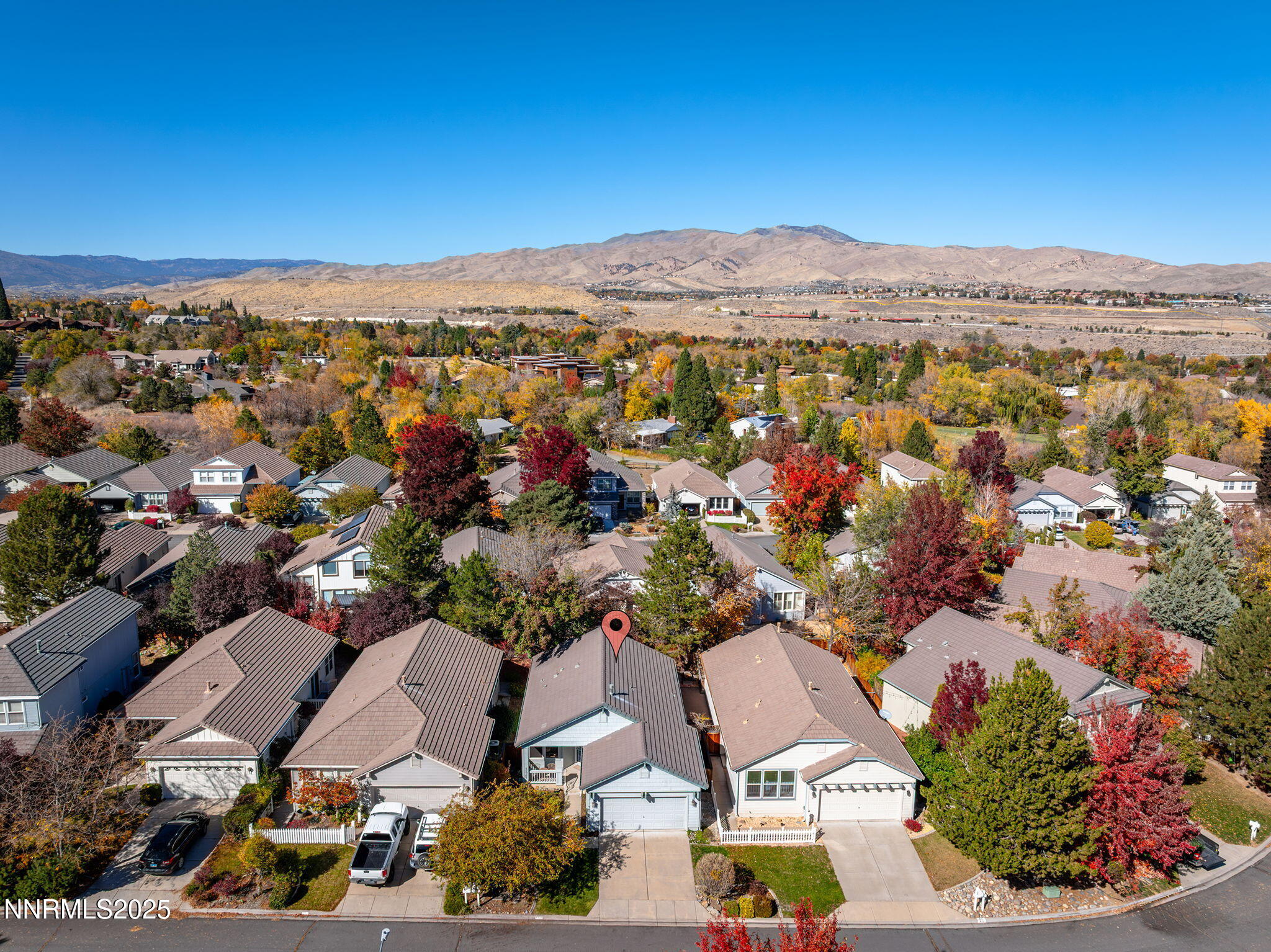 825 Caughlin Crossing, Unit CAUGHLIN RANCH PKWY Reno, NV 89519 - Photo 25 of 35 an aerial view of residential houses with outdoor space