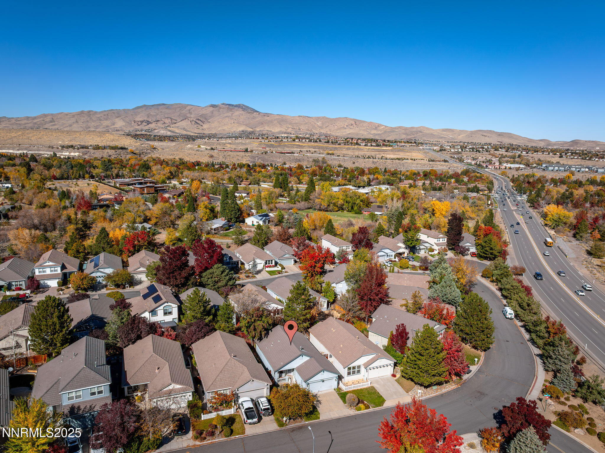 825 Caughlin Crossing, Unit CAUGHLIN RANCH PKWY Reno, NV 89519 - Photo 27 of 35 an aerial view of residential houses with outdoor space