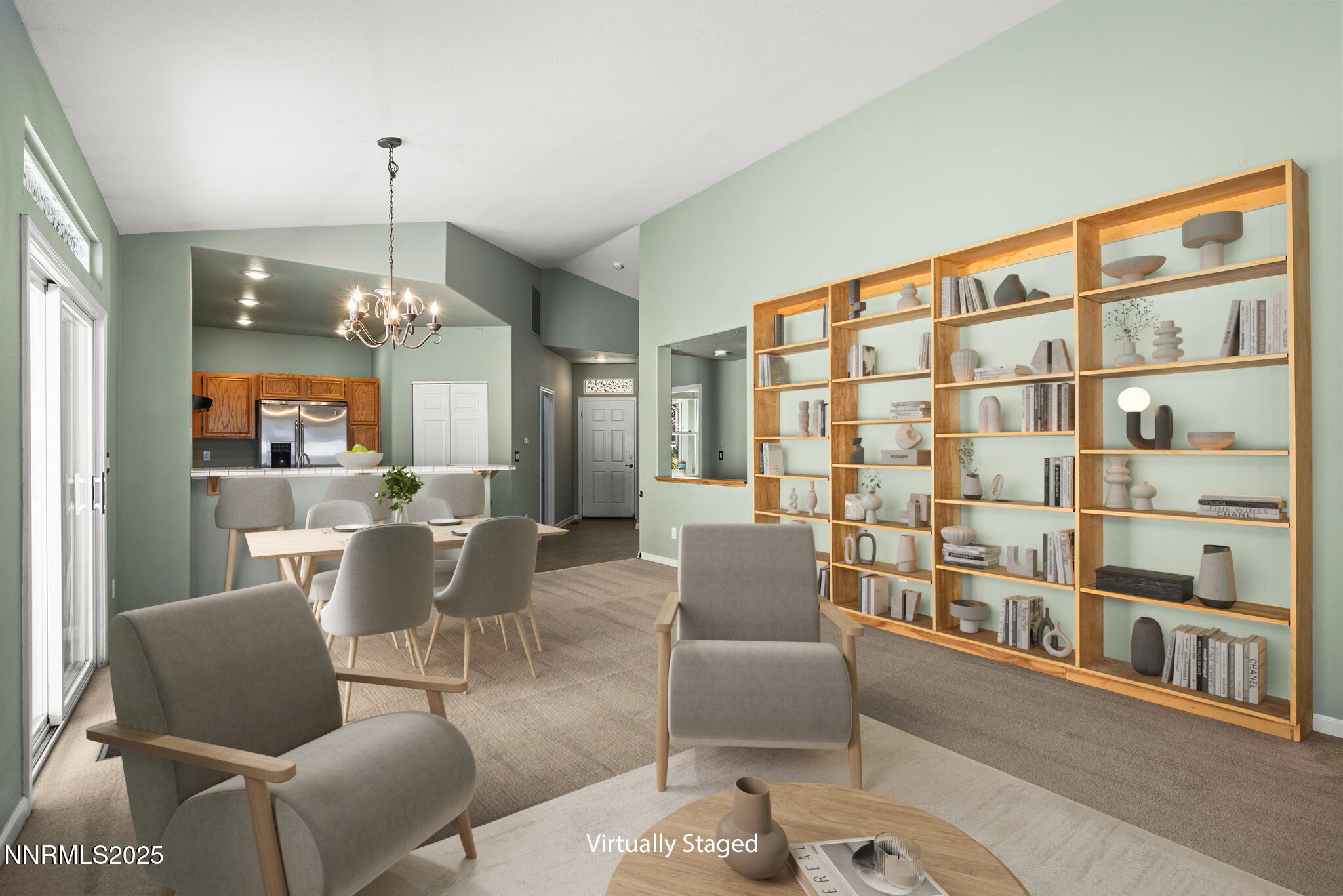 825 Caughlin Crossing, Unit CAUGHLIN RANCH PKWY Reno, NV 89519 - Photo 5 of 35 a dining room with furniture a rug and a chandelier