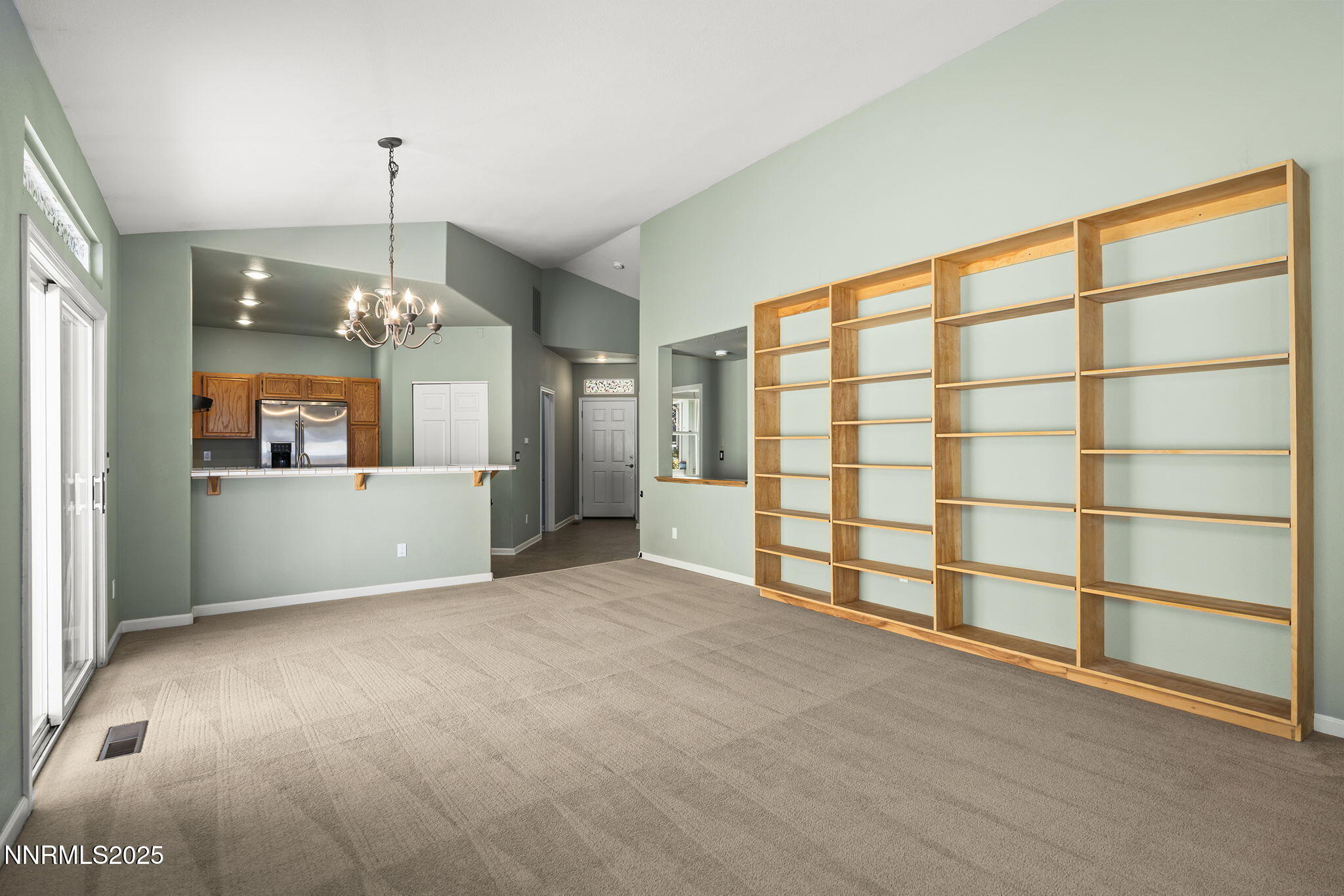 825 Caughlin Crossing, Unit CAUGHLIN RANCH PKWY Reno, NV 89519 - Photo 6 of 35 a view of an empty room with a window