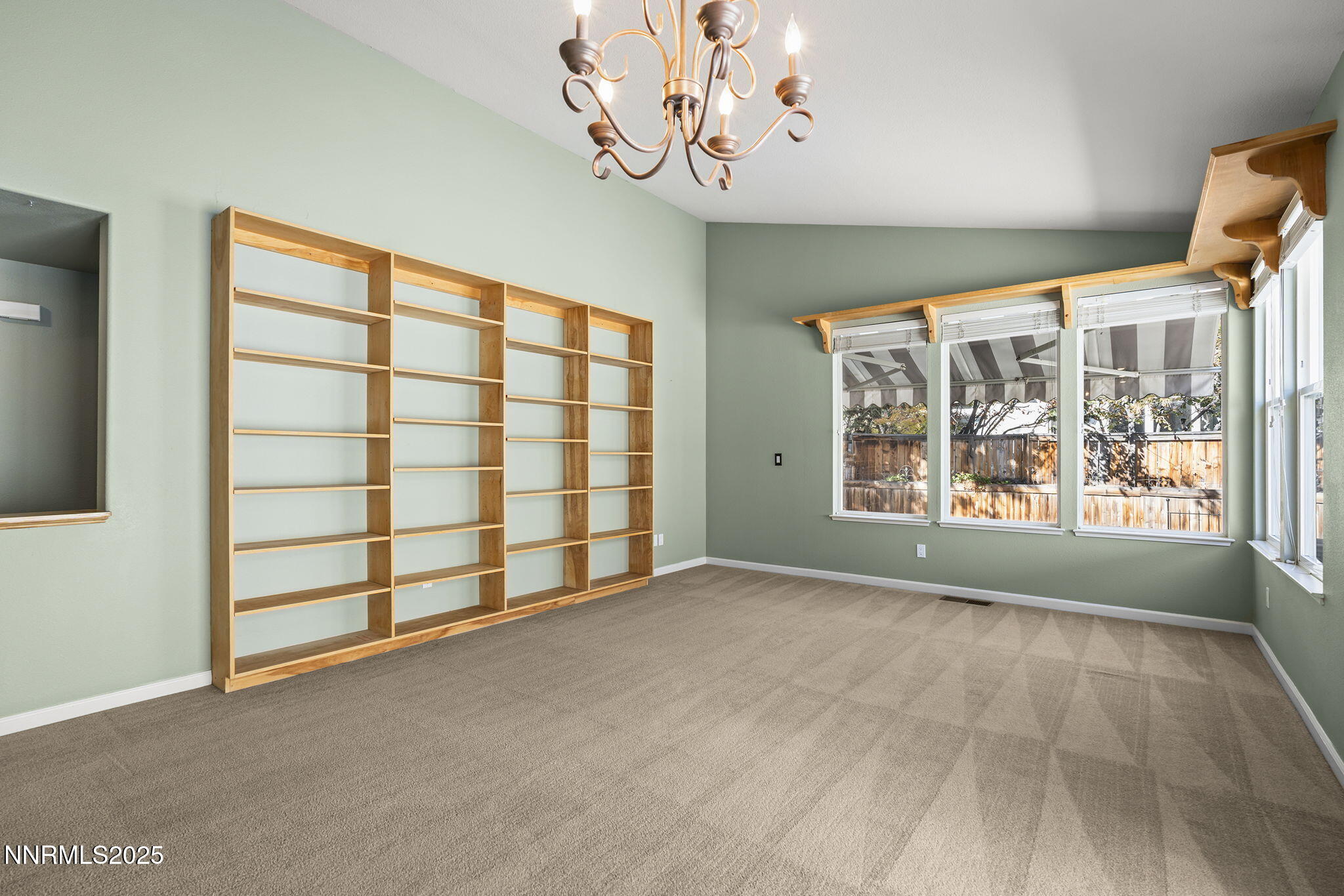 825 Caughlin Crossing, Unit CAUGHLIN RANCH PKWY Reno, NV 89519 - Photo 7 of 35 a view of an empty room with a window