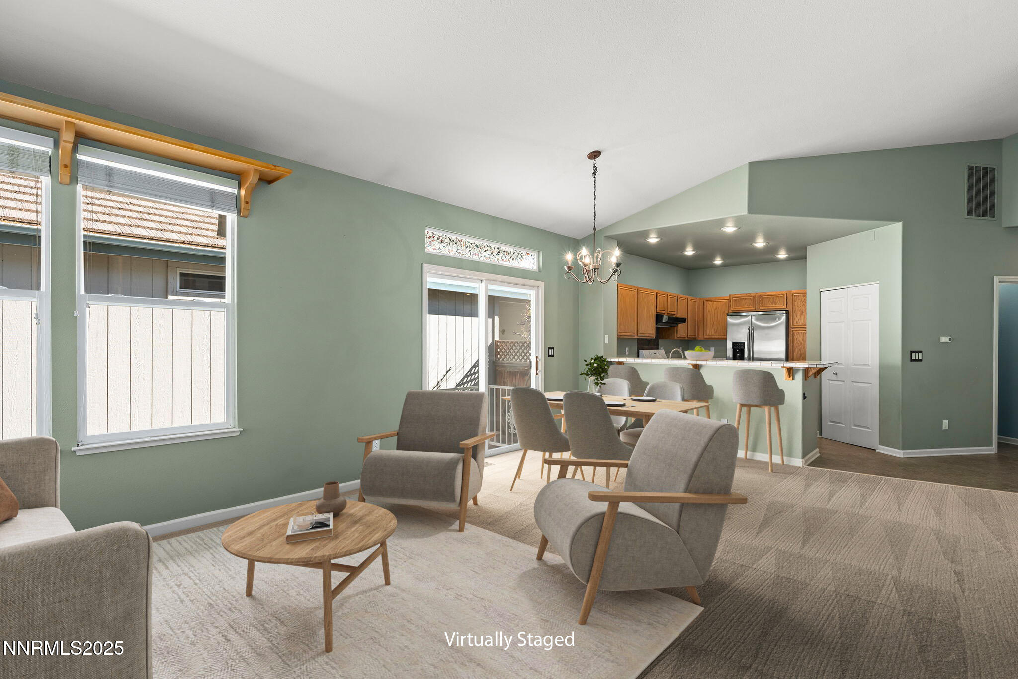 825 Caughlin Crossing, Unit CAUGHLIN RANCH PKWY Reno, NV 89519 - Photo 8 of 35 a living room with furniture and a wooden floor