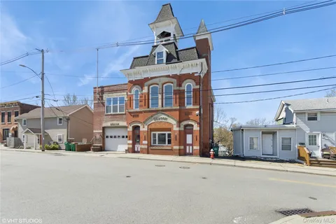 a front view of a building with street