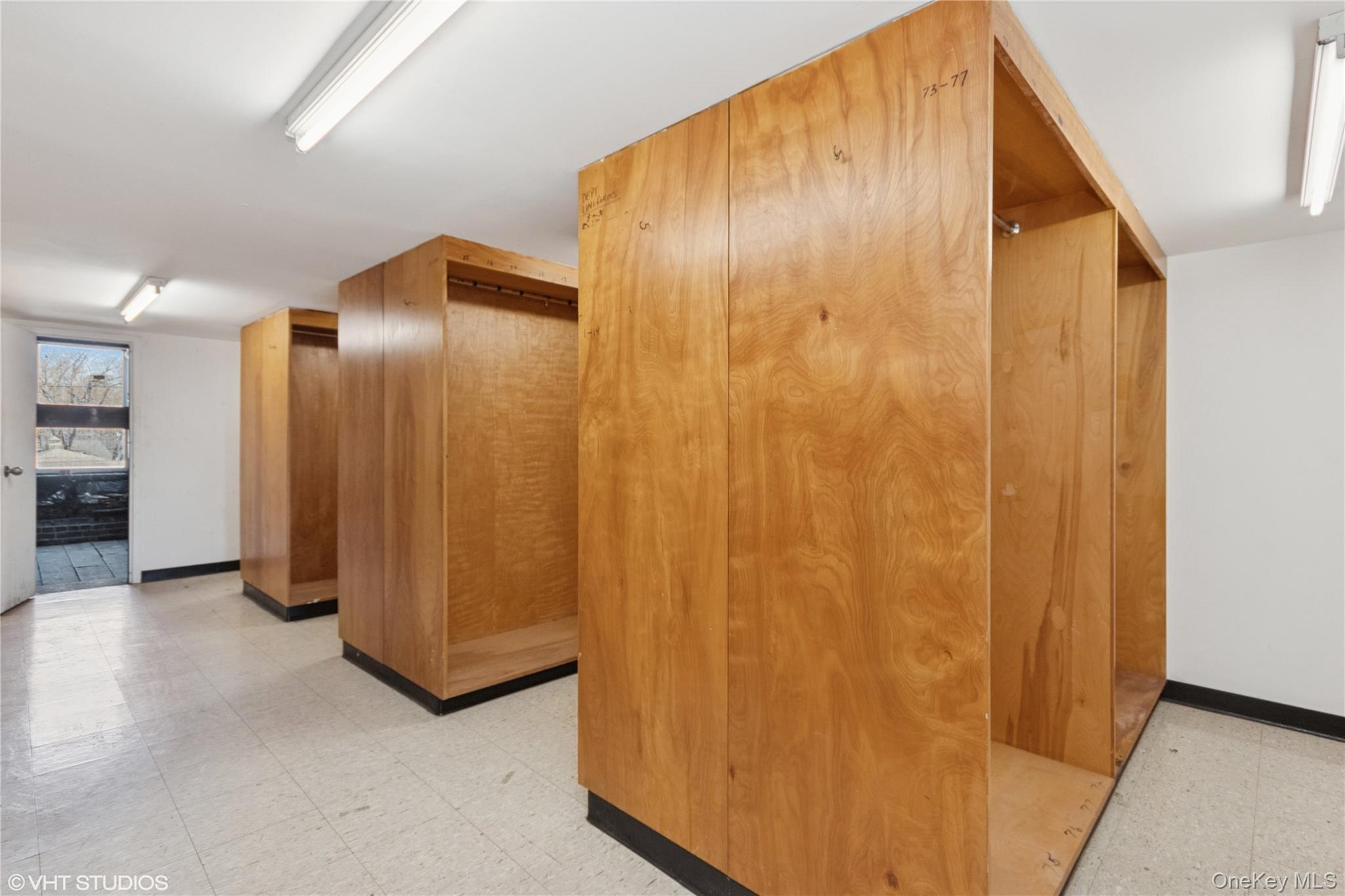 57 East Main Street Beacon, NY 12508 - Photo 14 of 48 a view of a hallway with wooden walls