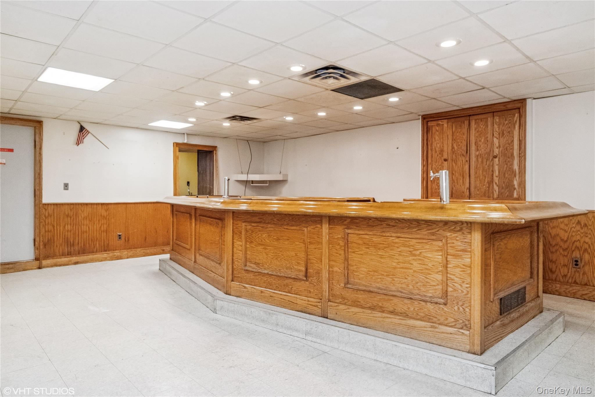 57 East Main Street Beacon, NY 12508 - Photo 19 of 48 a kitchen with stainless steel appliances granite countertop a sink and cabinets