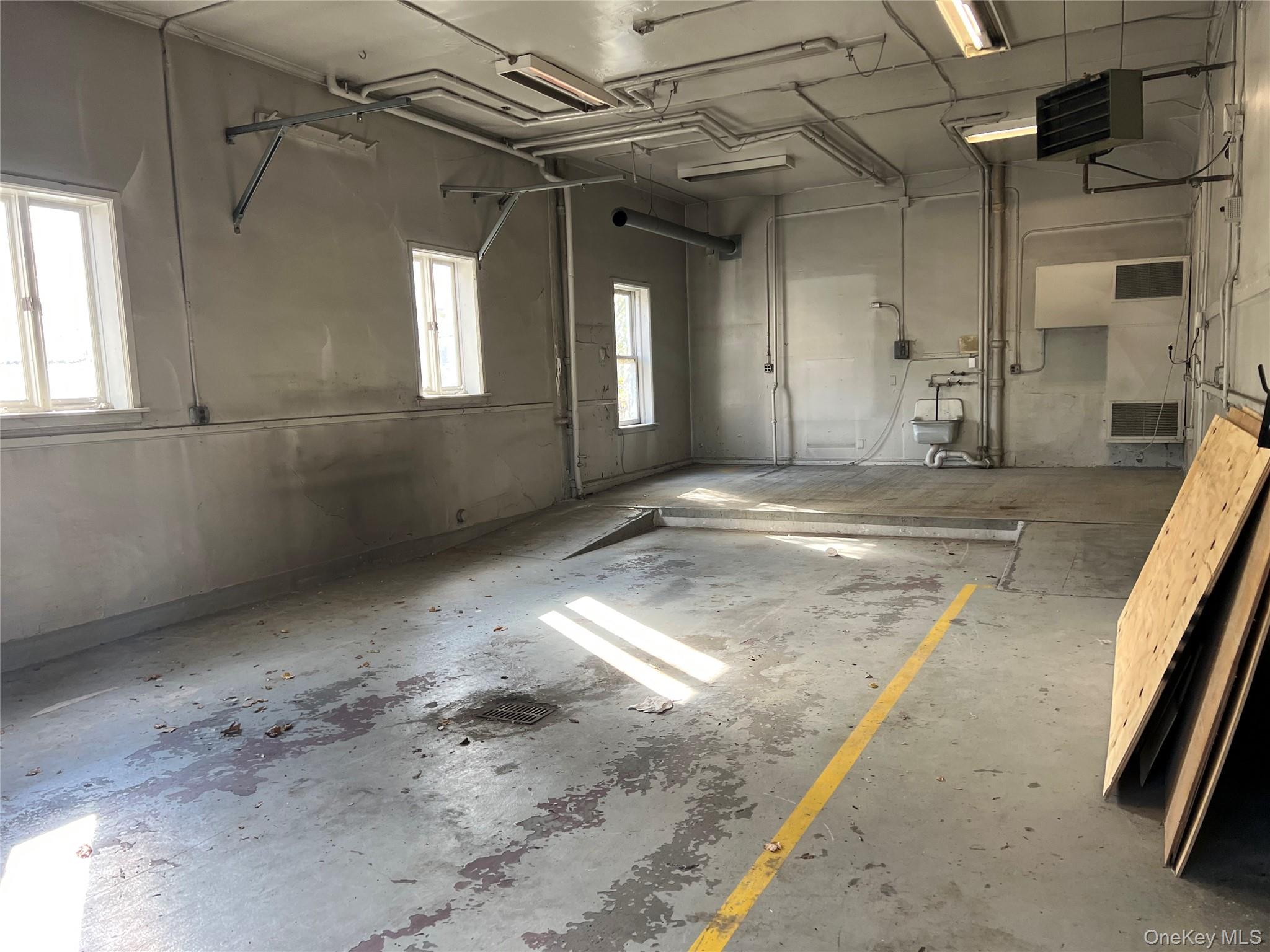 57 East Main Street Beacon, NY 12508 - Photo 27 of 48 a view of a hallway with a window