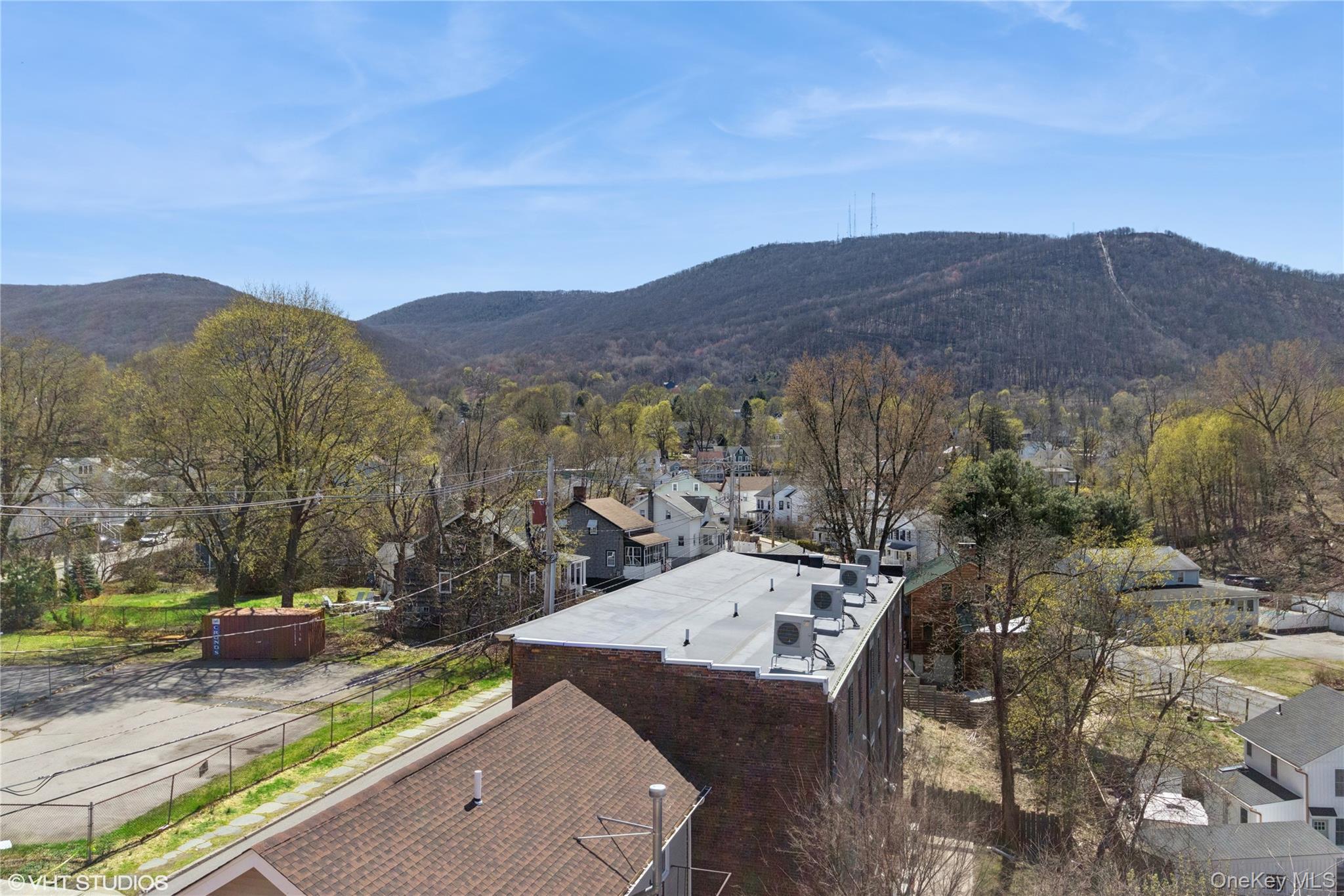 57 East Main Street Beacon, NY 12508 - Photo 35 of 48 a view of a house with a mountain in the background