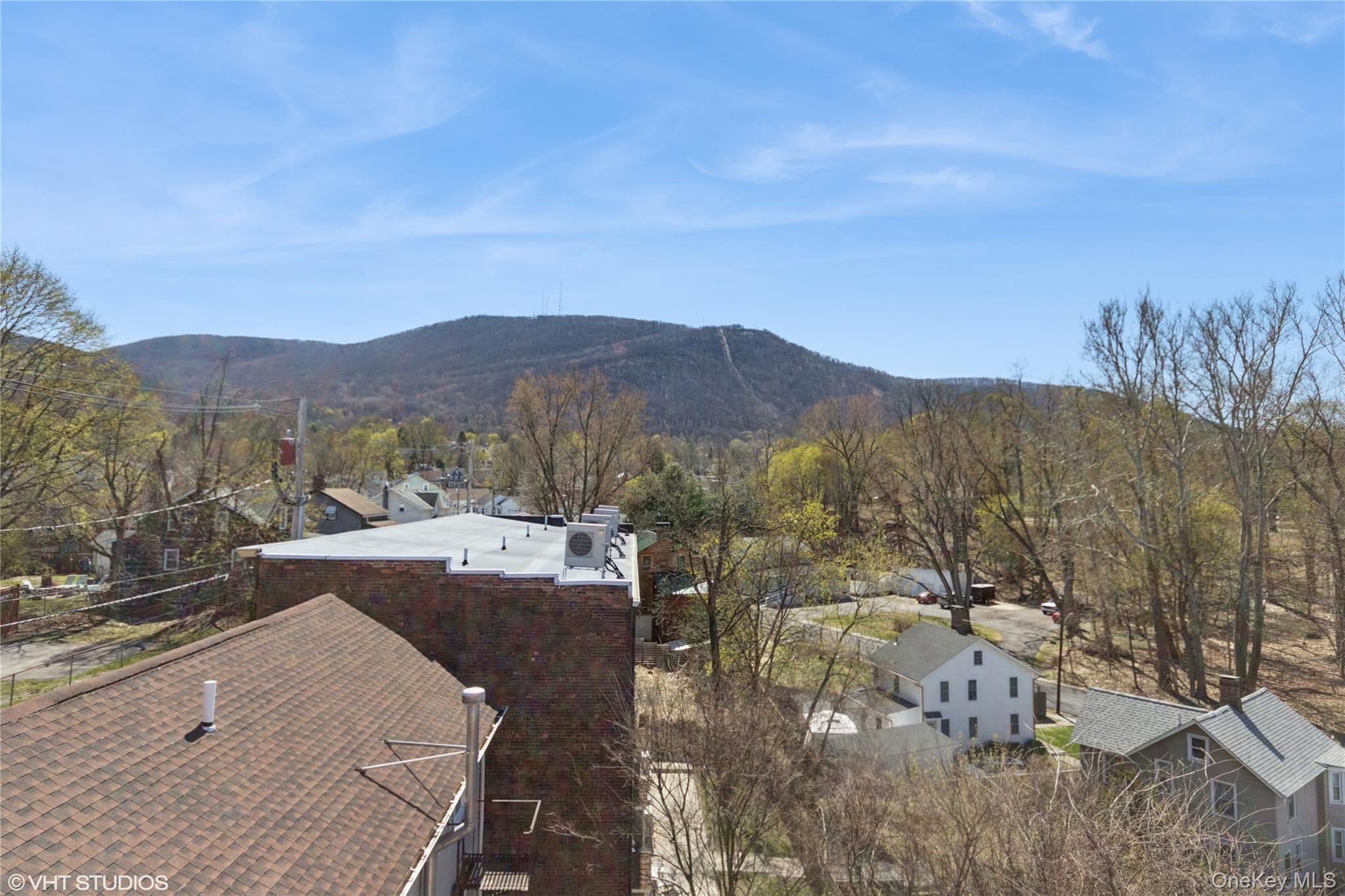 57 East Main Street Beacon, NY 12508 - Photo 38 of 48 a view of a house with a yard and mountain