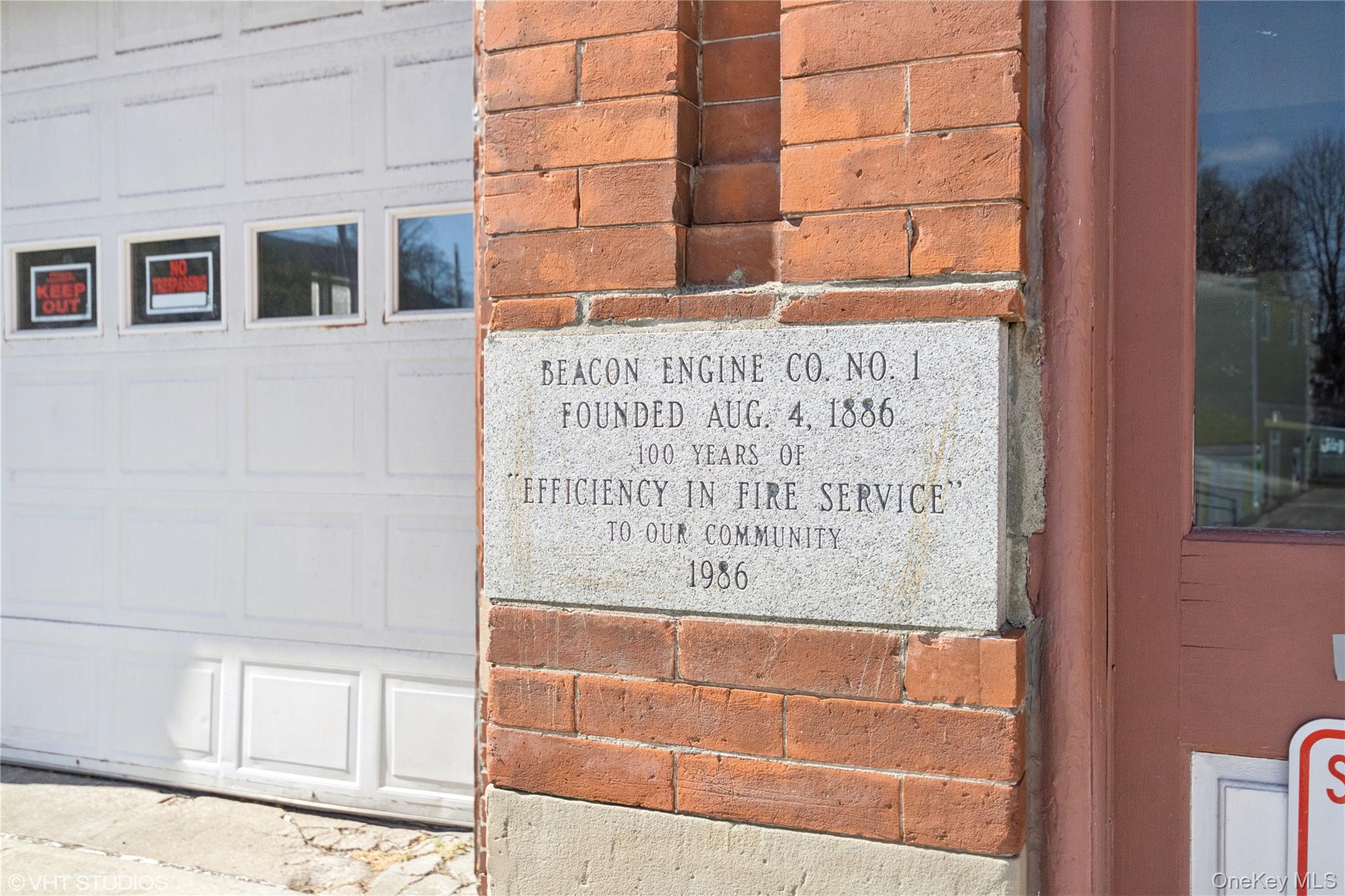 57 East Main Street Beacon, NY 12508 - Photo 42 of 48 a sign on the side of a building