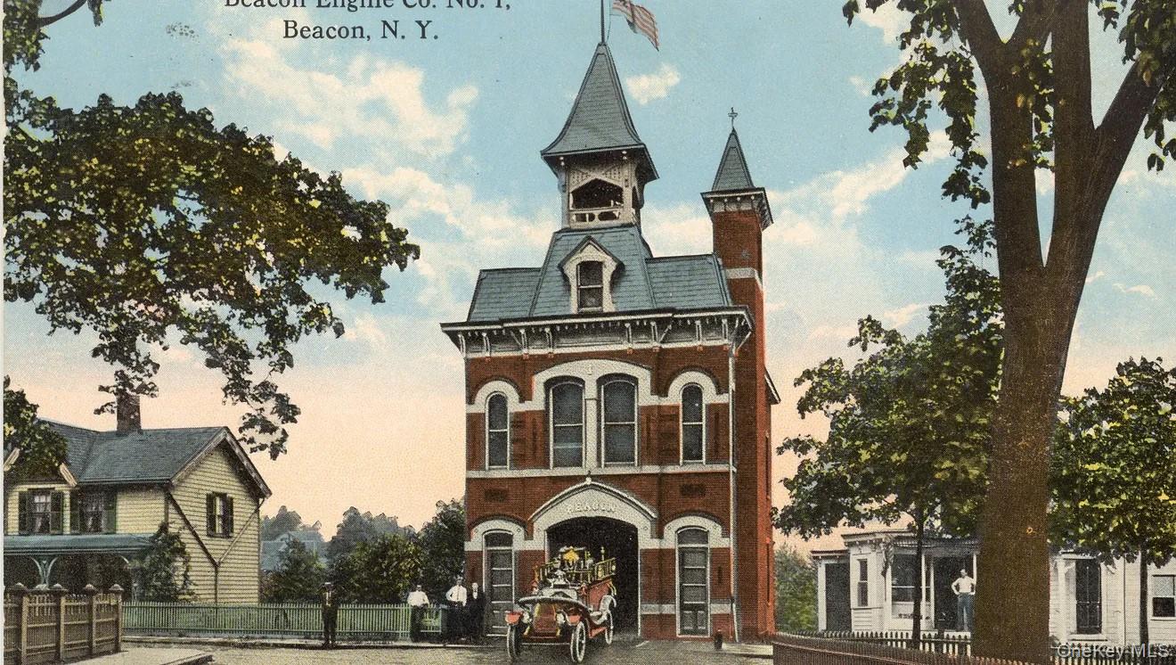 57 East Main Street Beacon, NY 12508 - Photo 43 of 48 a front view of a house with a yard