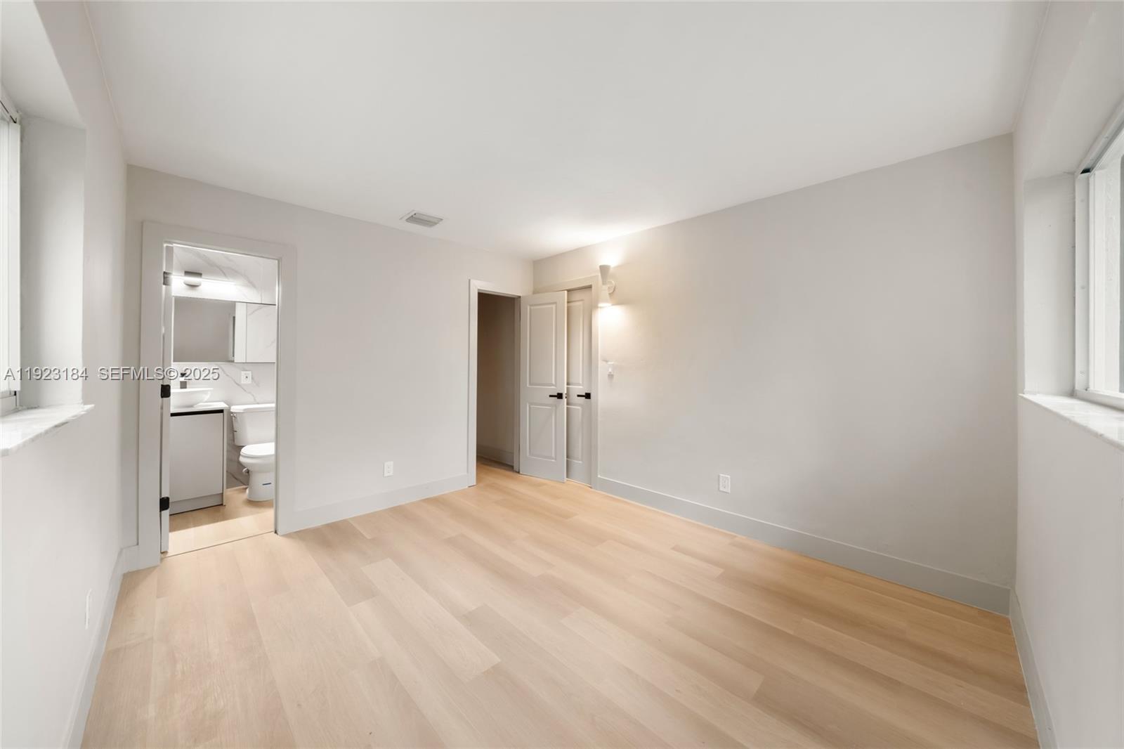 2350 Northwest 56th Street Miami, FL 33142 - Photo 12 of 22 a view of a kitchen with a sink and a cabinet