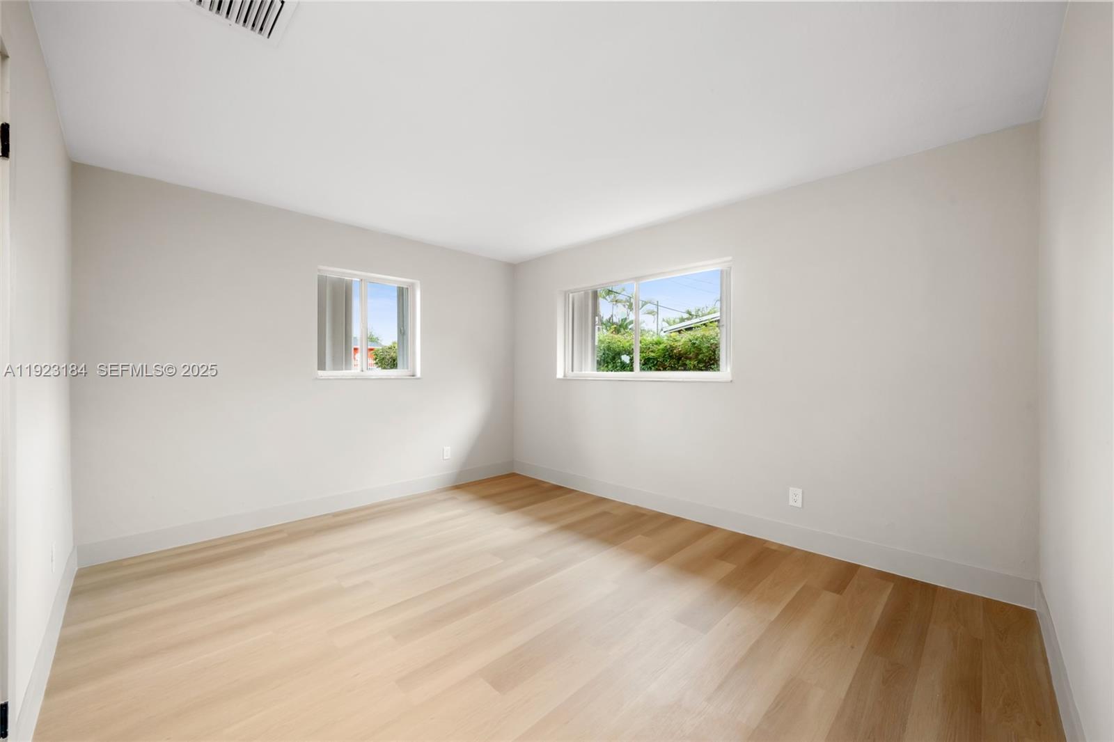 2350 Northwest 56th Street Miami, FL 33142 - Photo 15 of 22 a view of an empty room with a window