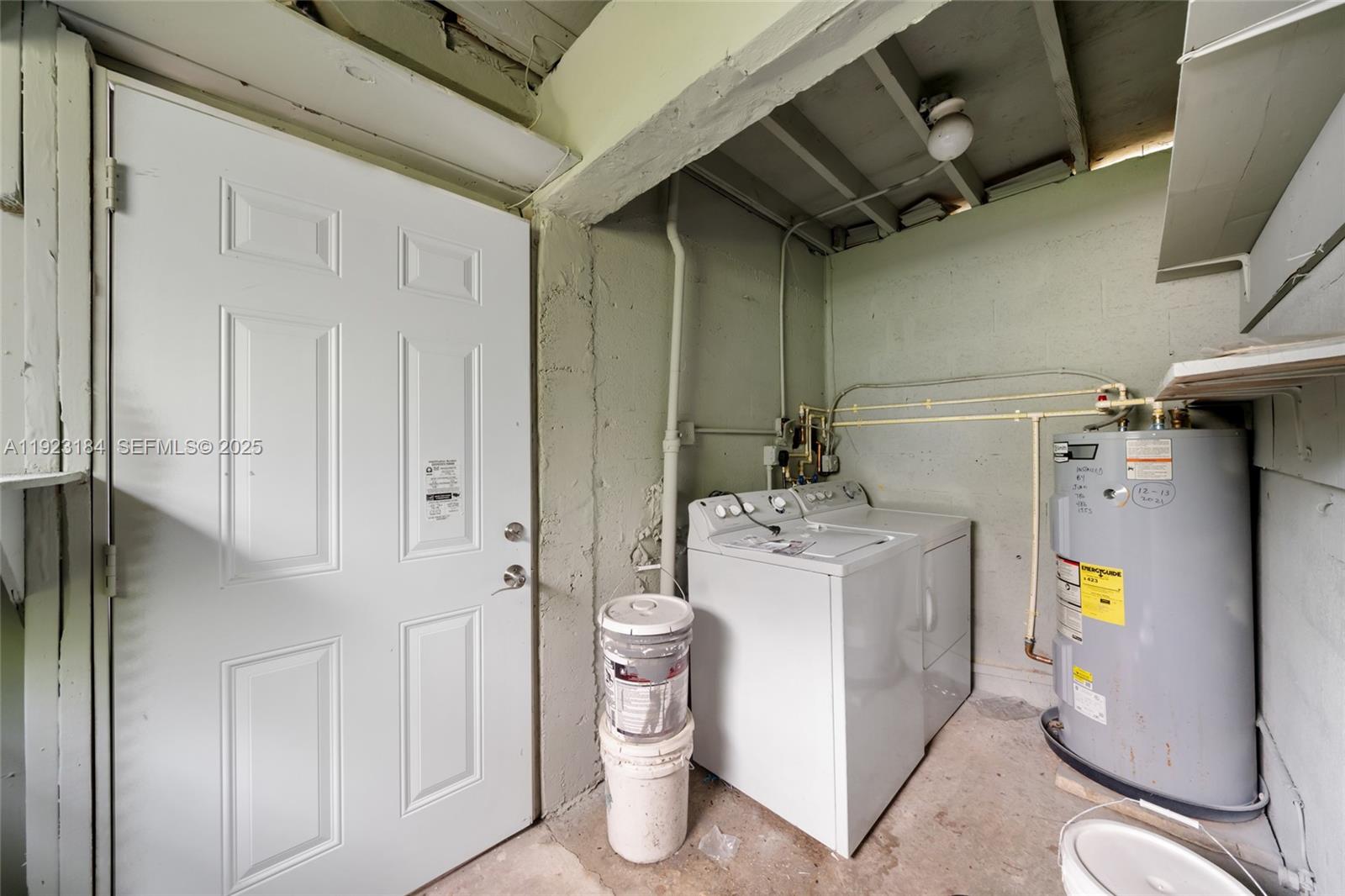2350 Northwest 56th Street Miami, FL 33142 - Photo 20 of 22 a utility room with dryer and washer