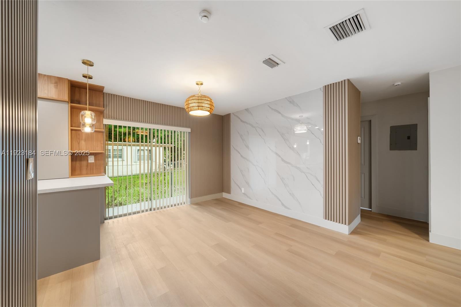 2350 Northwest 56th Street Miami, FL 33142 - Photo 2 of 22 a view of an empty room and window