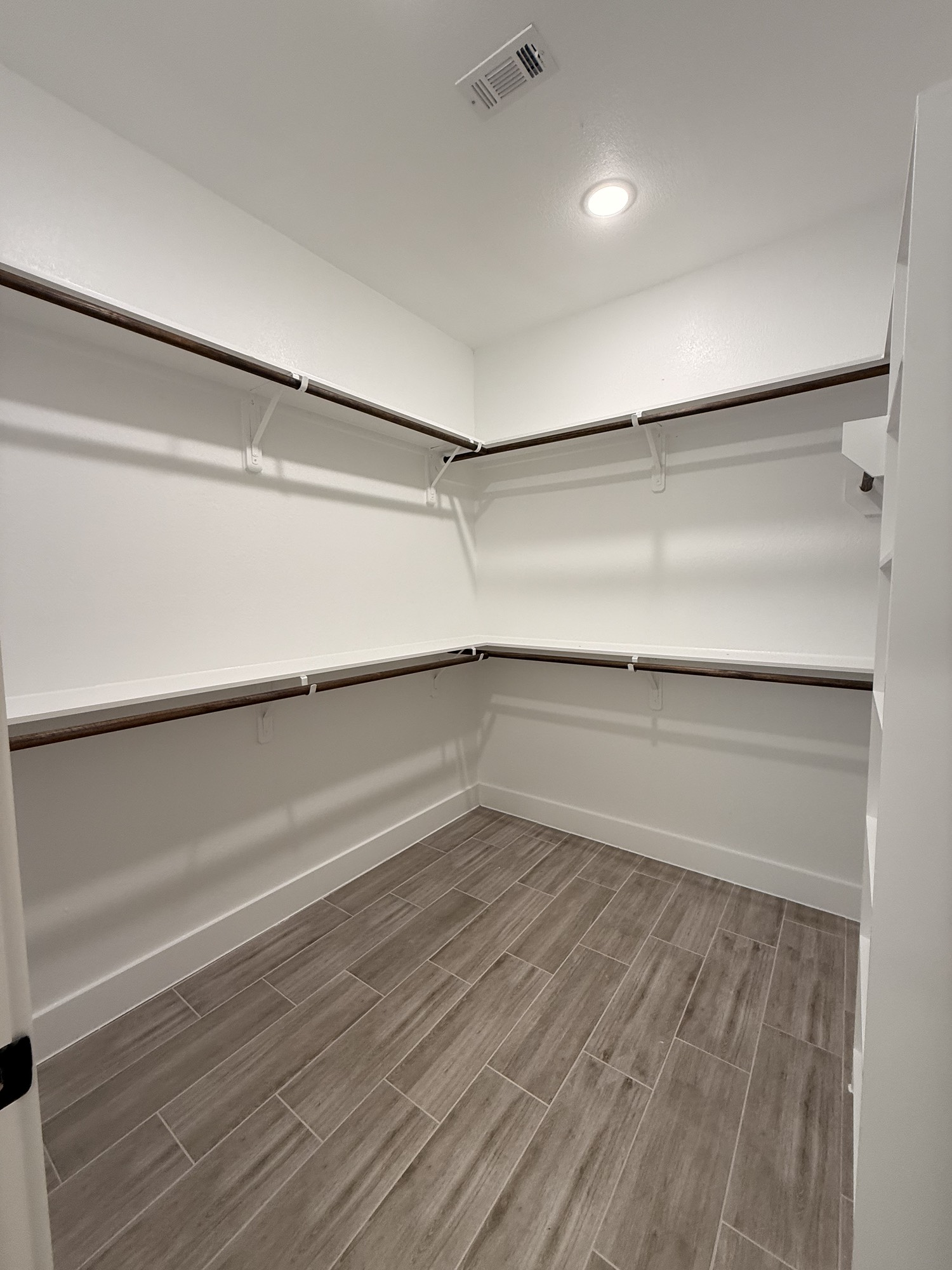 14844 Coaltown Road Willis, TX 77378 - Photo 8 of 30 a view of an empty walk in closet