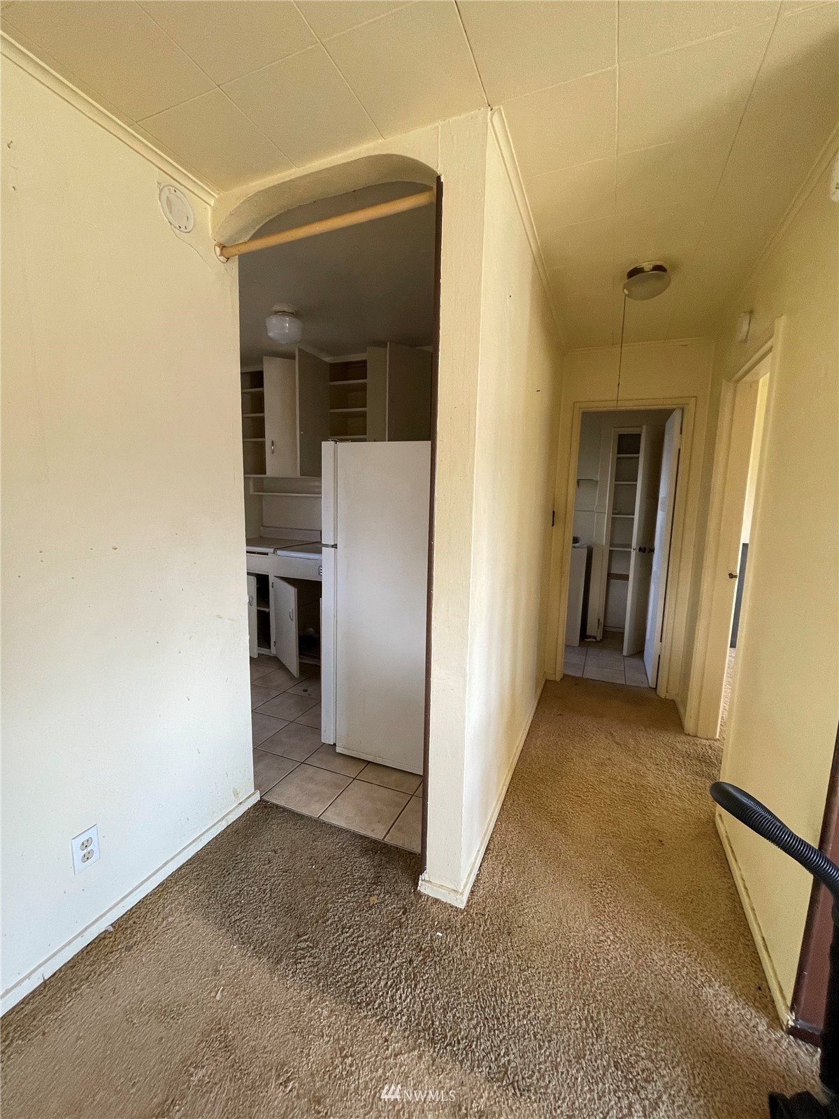 751 Camas Avenue Northeast Renton, WA 98056 - Photo 4 of 4 a view of a hallway with wooden shelves