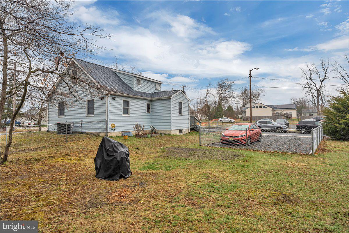 20 West Laurel Road Stratford, NJ 08084 - Photo 24 of 24 a front view of a house with garden