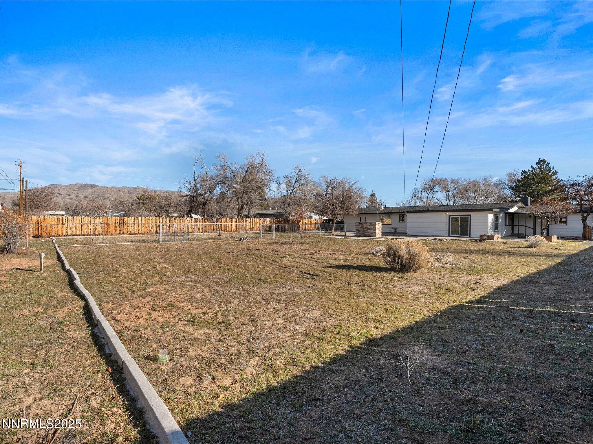2940 Lukens Lane Carson City, NV 89706 - Photo 3 of 46 a view of a swimming pool with a lake view