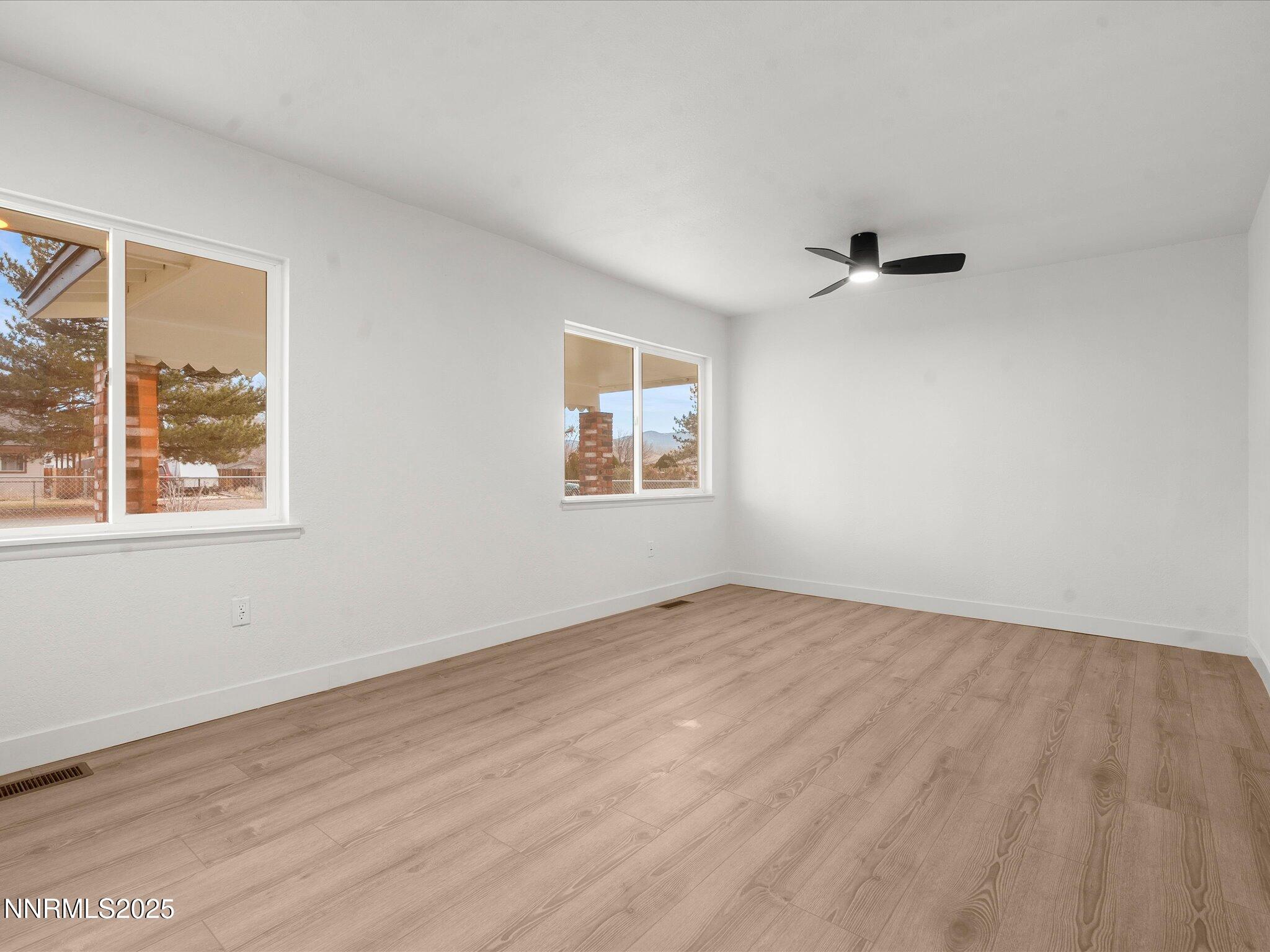 2940 Lukens Lane Carson City, NV 89706 - Photo 31 of 46 wooden floor in an empty room with a window