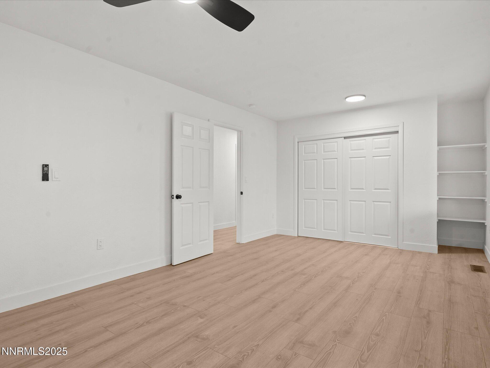 2940 Lukens Lane Carson City, NV 89706 - Photo 32 of 46 a view of empty room with wooden floor