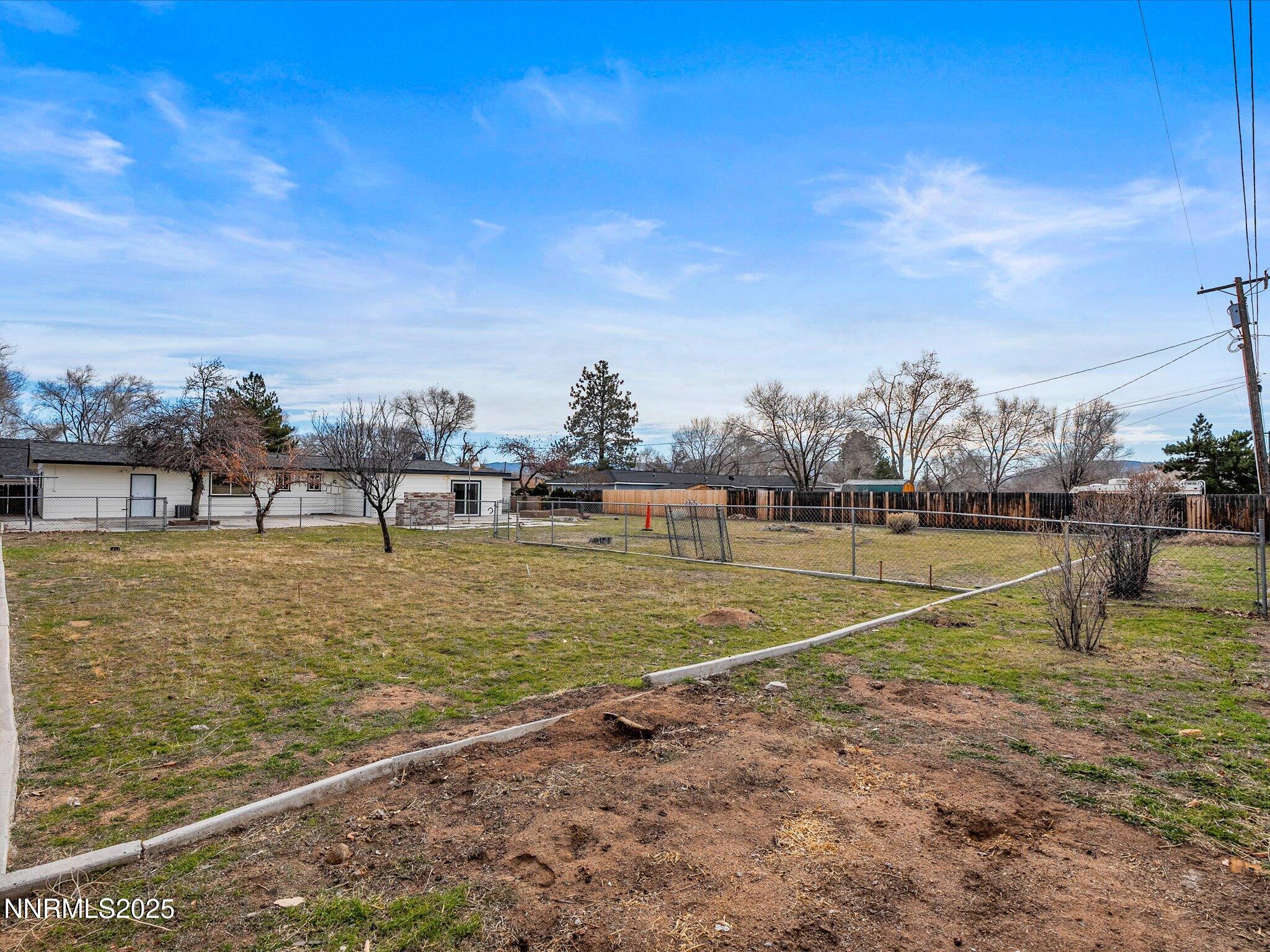 2940 Lukens Lane Carson City, NV 89706 - Photo 39 of 46 a view of swimming pool with outdoor seating and yard in back
