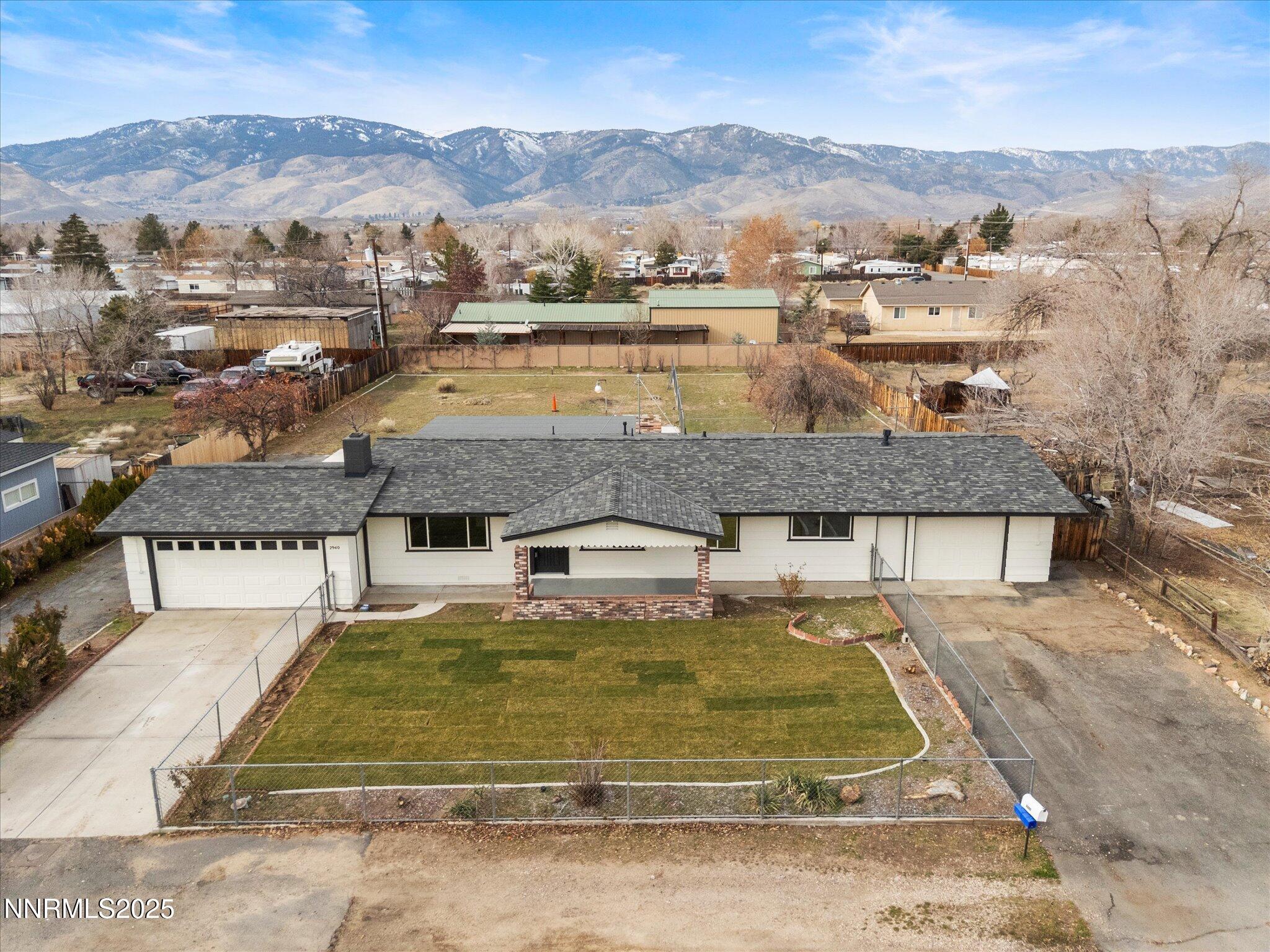 2940 Lukens Lane Carson City, NV 89706 - Photo 41 of 46 a view of a swimming pool with mountains in the background