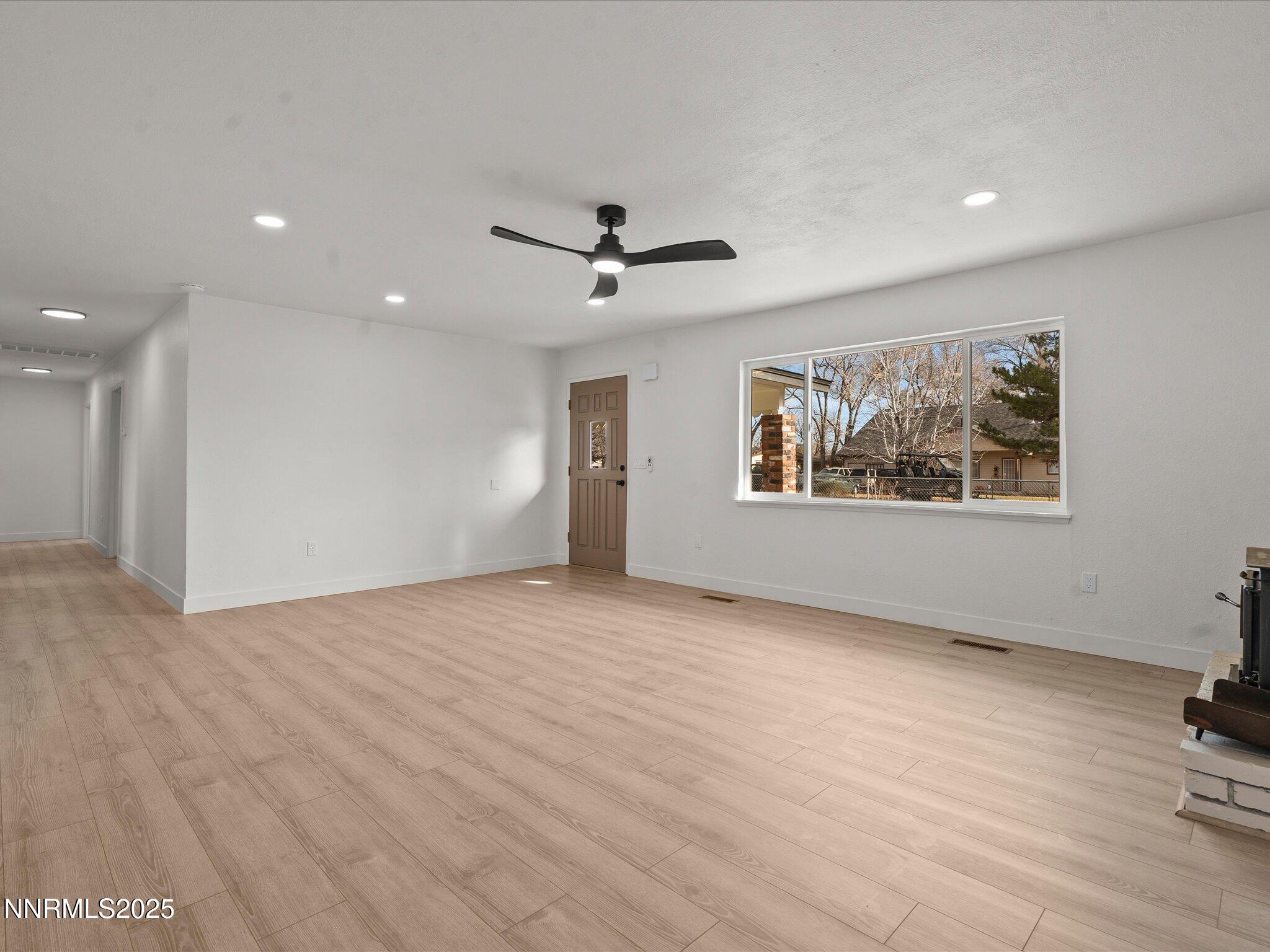 2940 Lukens Lane Carson City, NV 89706 - Photo 8 of 46 a view of an empty room with a window