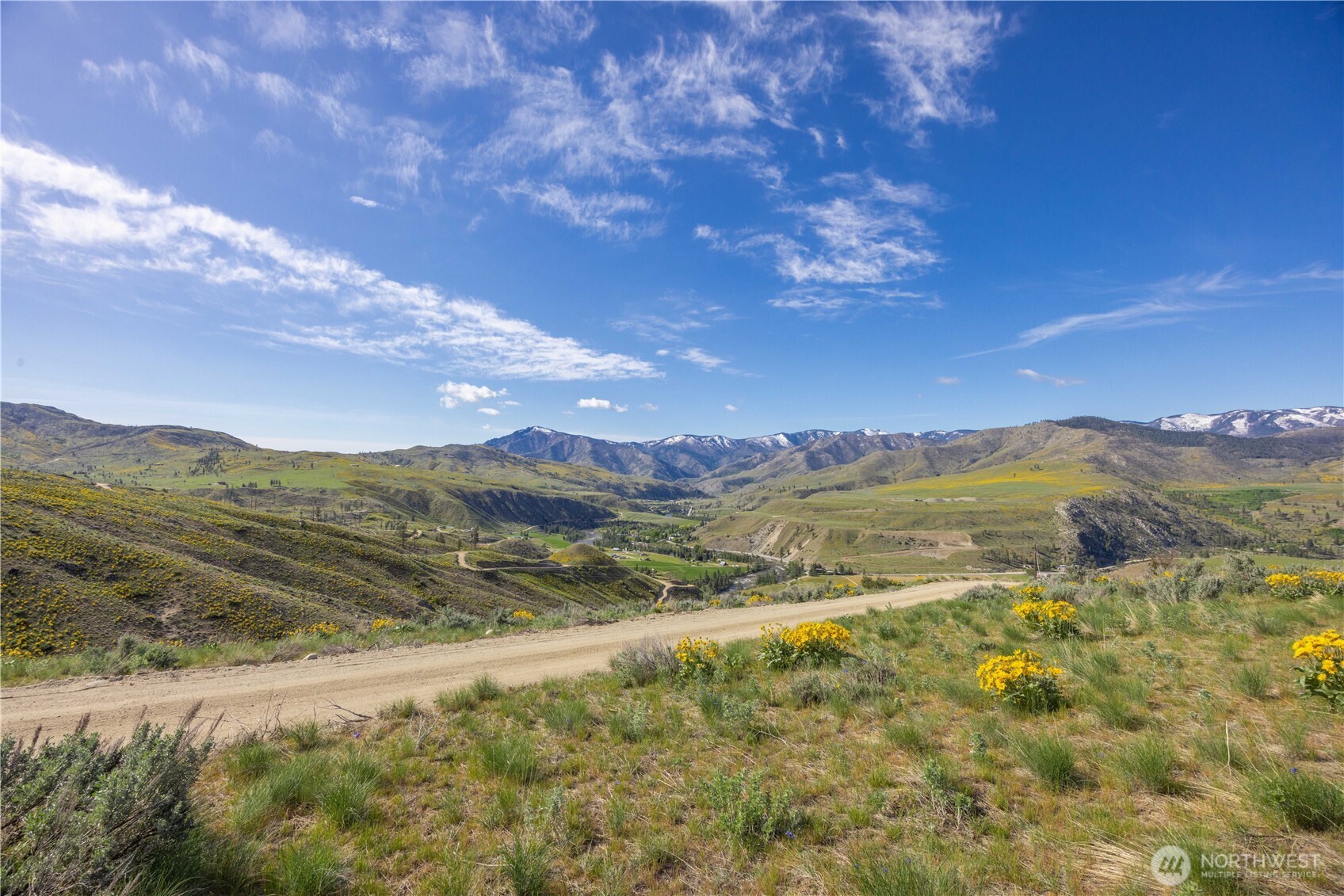 1 Terrace View Methow, WA 98834 - Photo 8 of 29 a view of a lake with mountains in the background