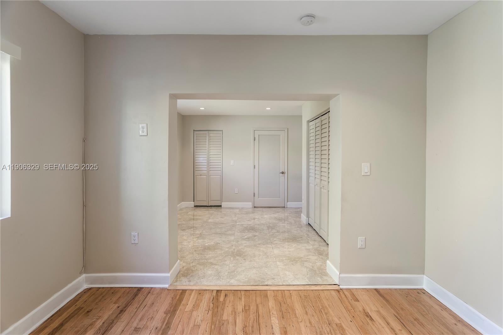 1776 Southwest 11th Terrace Miami, FL 33135 - Photo 13 of 25 a view of an empty room and wooden floor