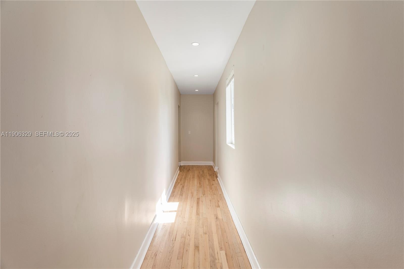 1776 Southwest 11th Terrace Miami, FL 33135 - Photo 15 of 25 a view of a hallway with wooden floor