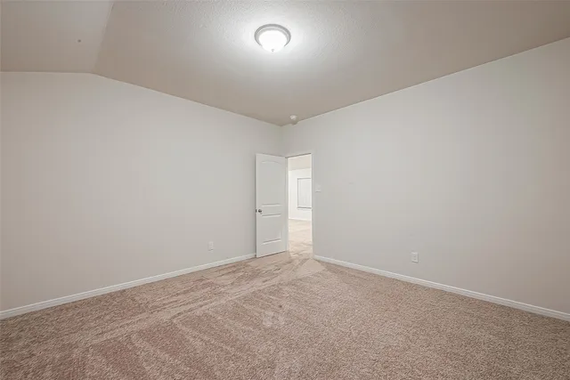 an empty room with a empty space and window