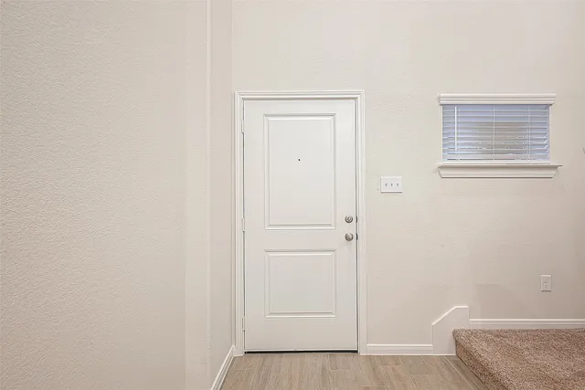 a view of small space with wooden floor